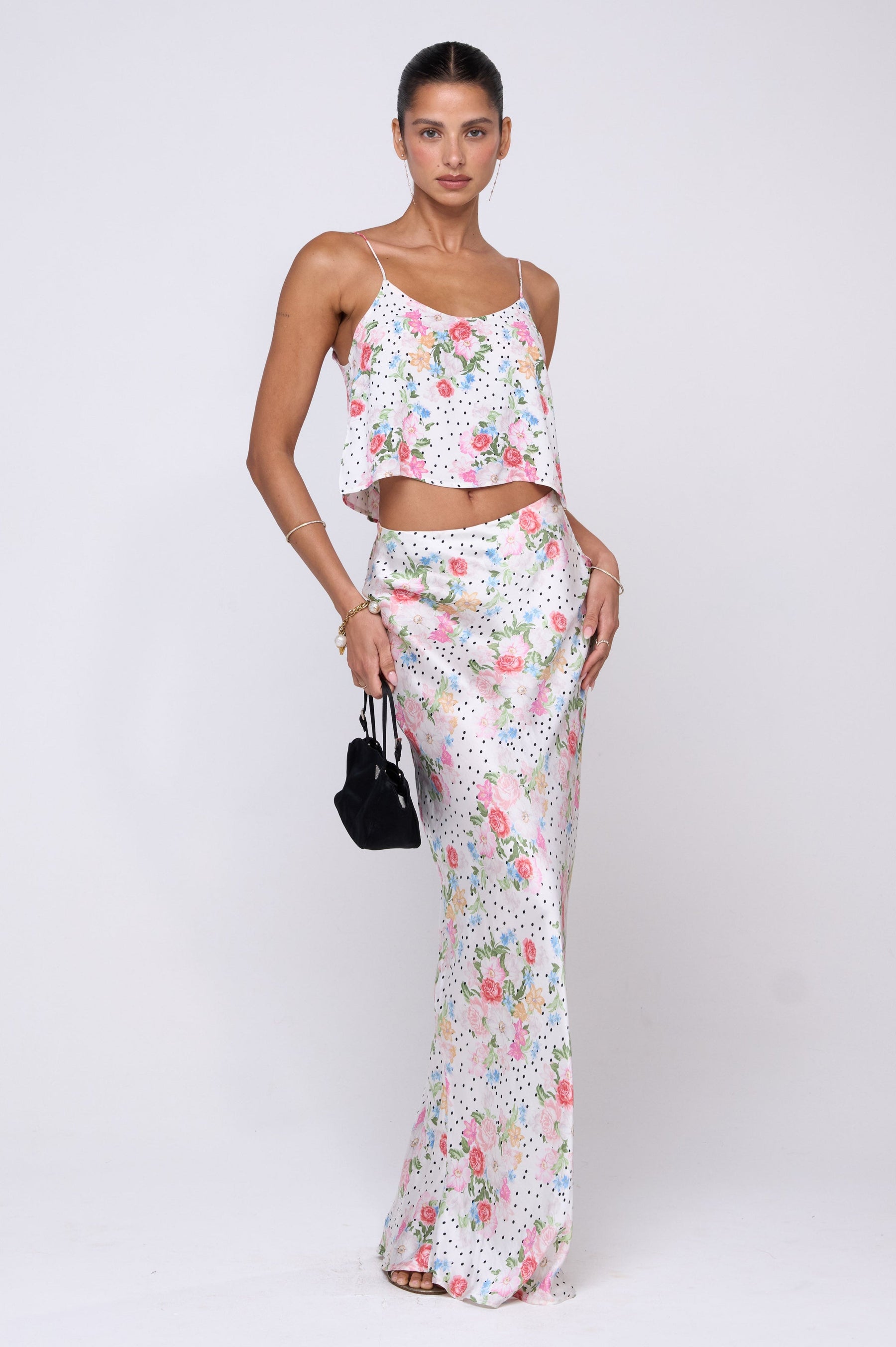This is an image of Claire Top in Pois - RESA featuring a model wearing the dress