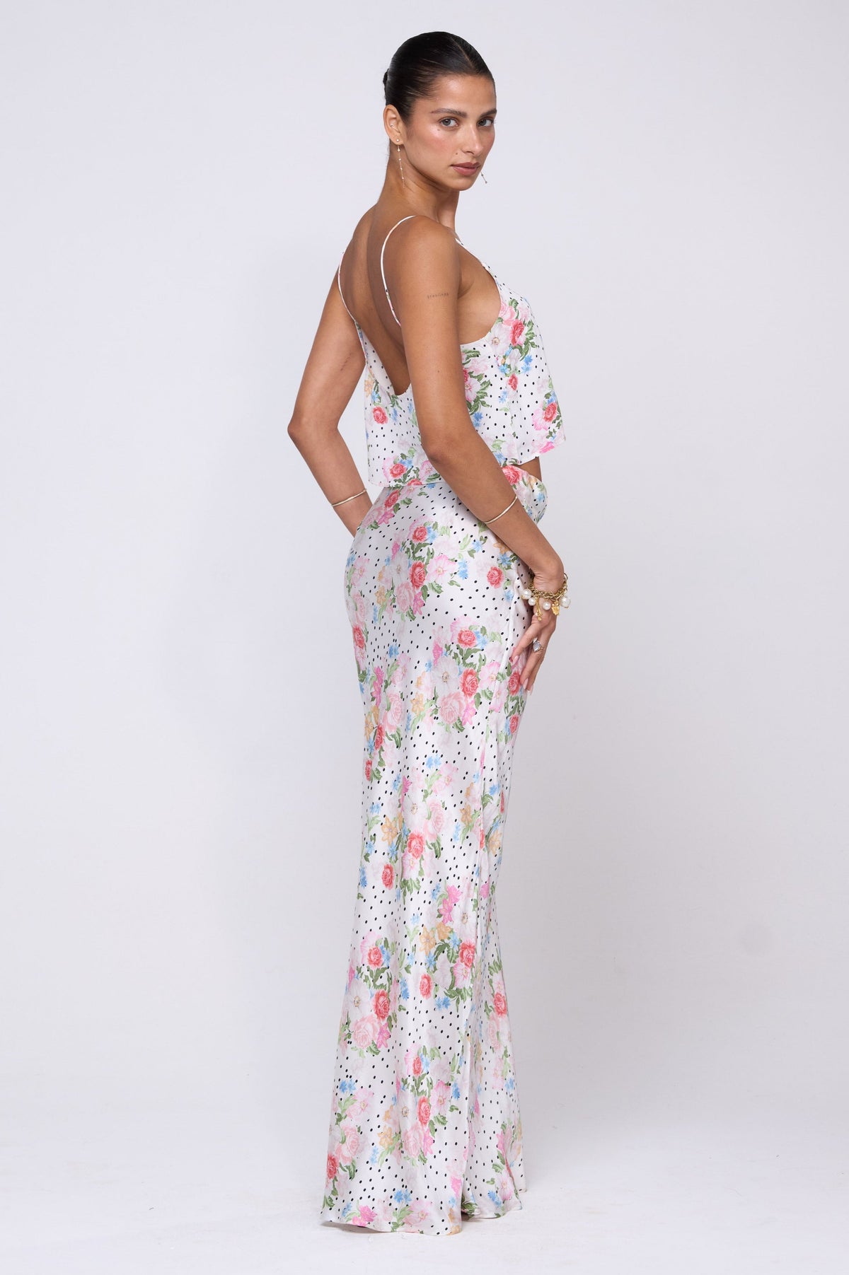 This is an image of Claire Top in Pois - RESA featuring a model wearing the dress