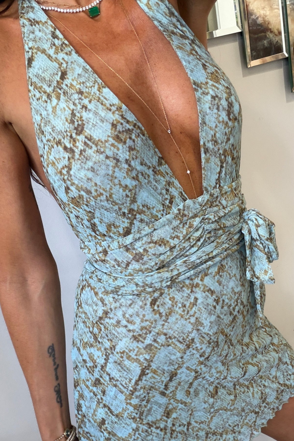 This is an image of Clint Dress in Azura - RESA featuring a model wearing the dress