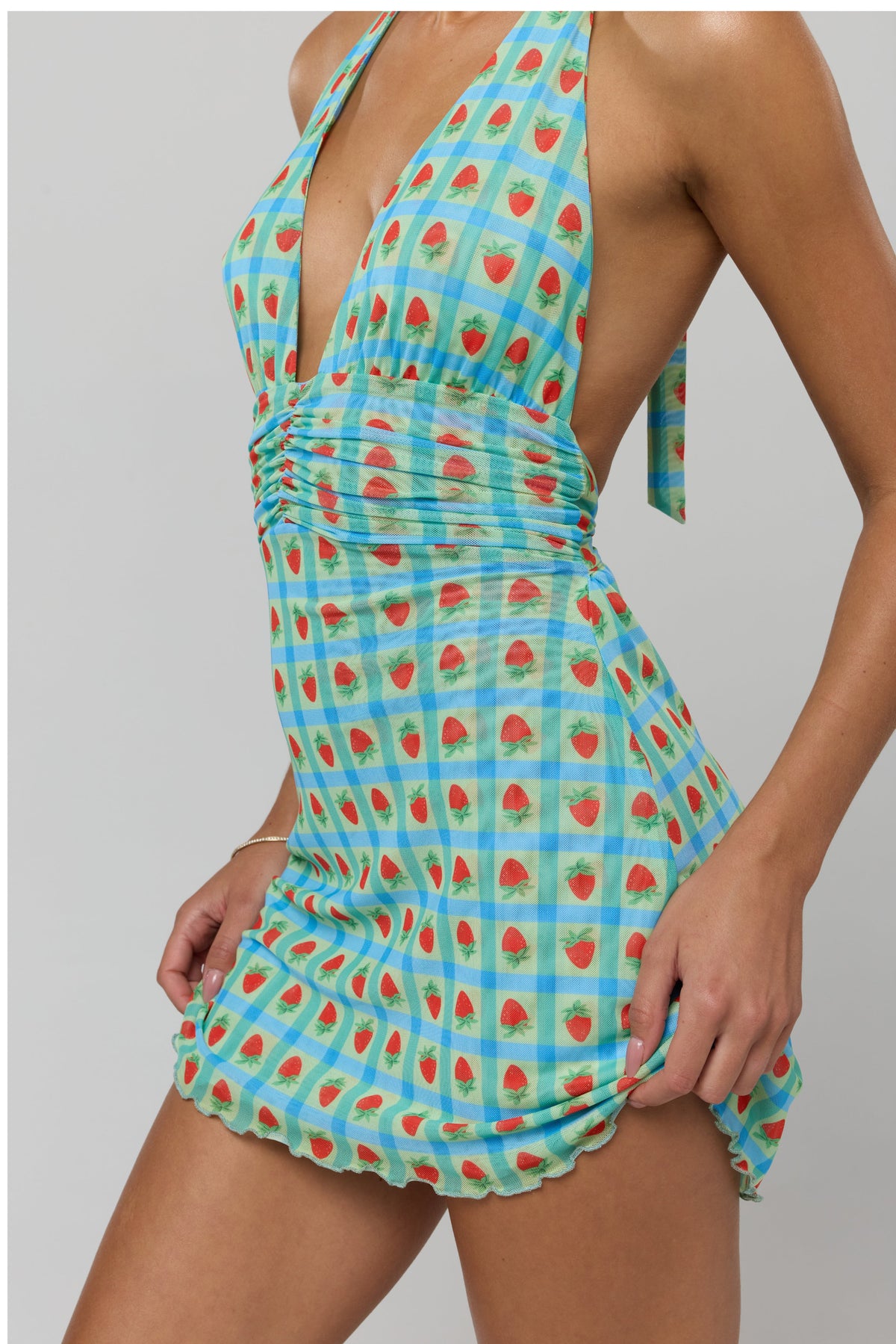 This is an image of Clint Dress in Juicy - RESA featuring a model wearing the dress