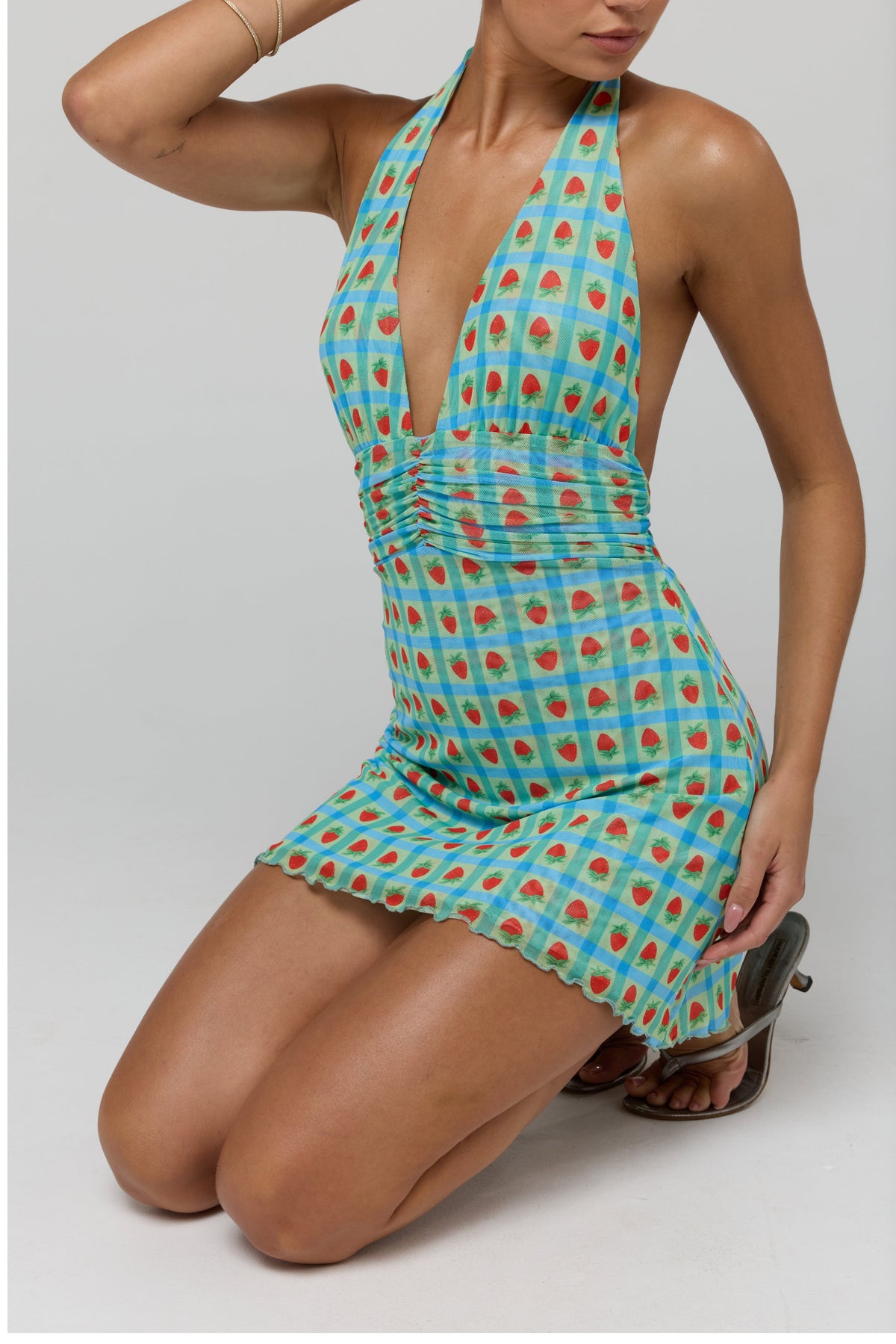 This is an image of Clint Dress in Juicy - RESA featuring a model wearing the dress