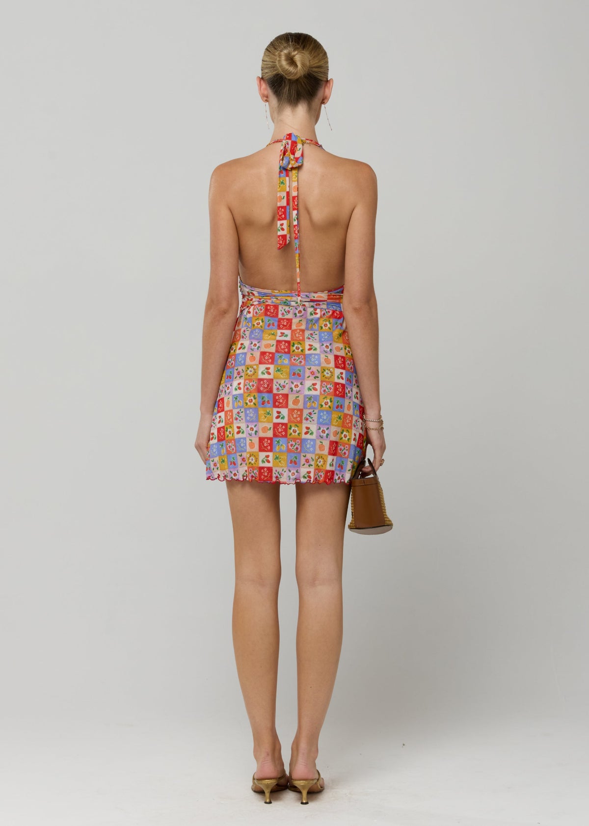 This is an image of Clint Dress in Picnic - RESA featuring a model wearing the dress