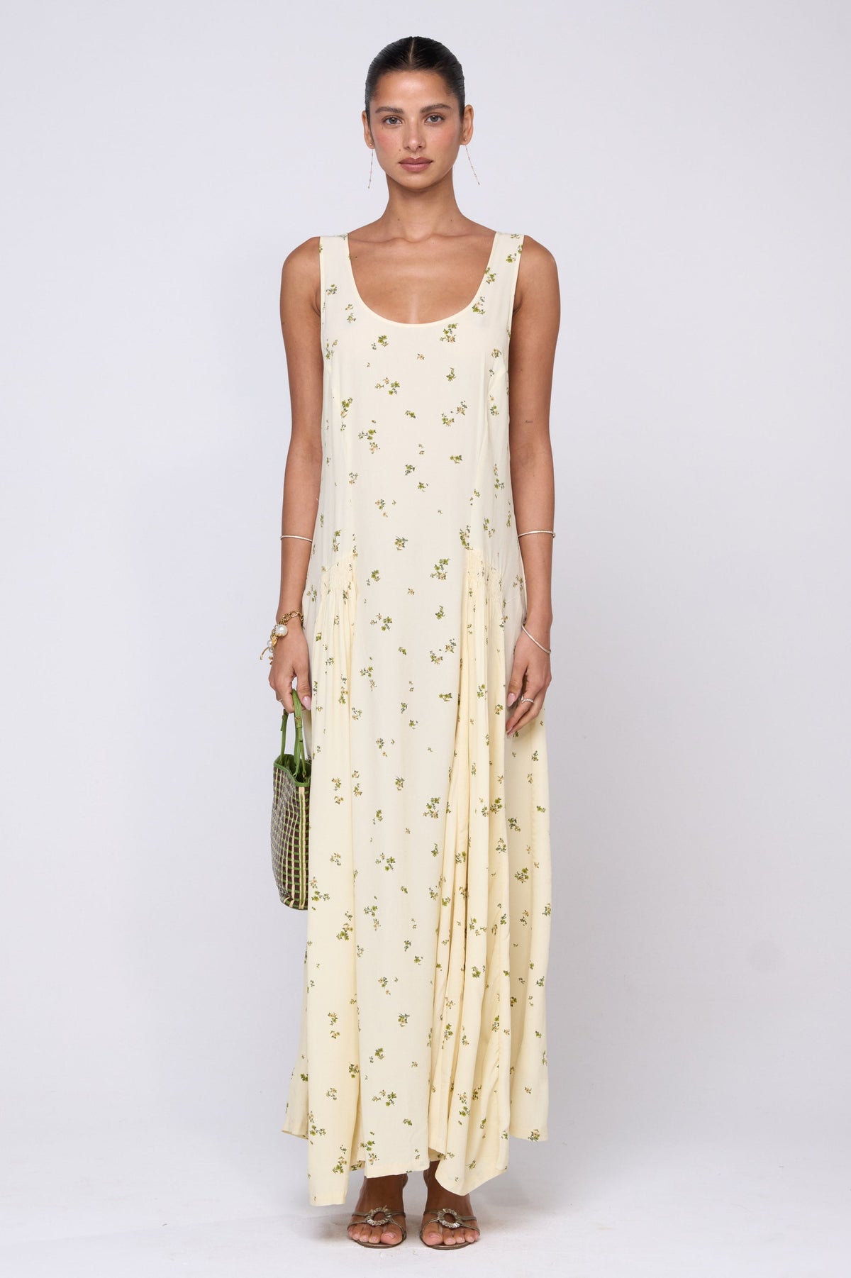 This is an image of Colette Dress in Beurre - RESA featuring a model wearing the dress