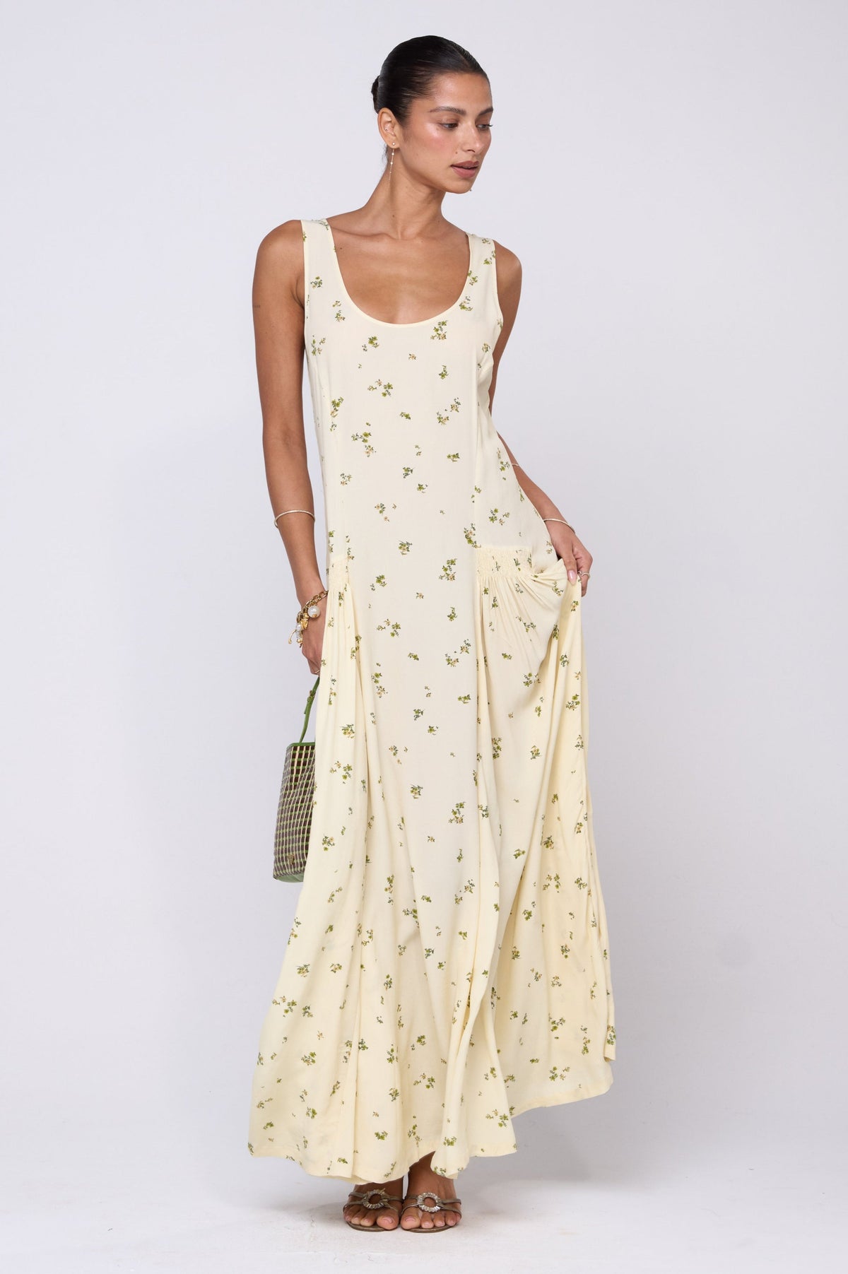 This is an image of Colette Dress in Beurre - RESA featuring a model wearing the dress
