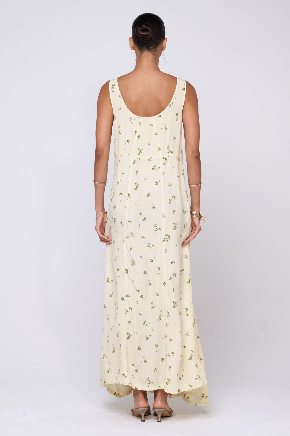 This is an image of Colette Dress in Beurre - RESA featuring a model wearing the dress