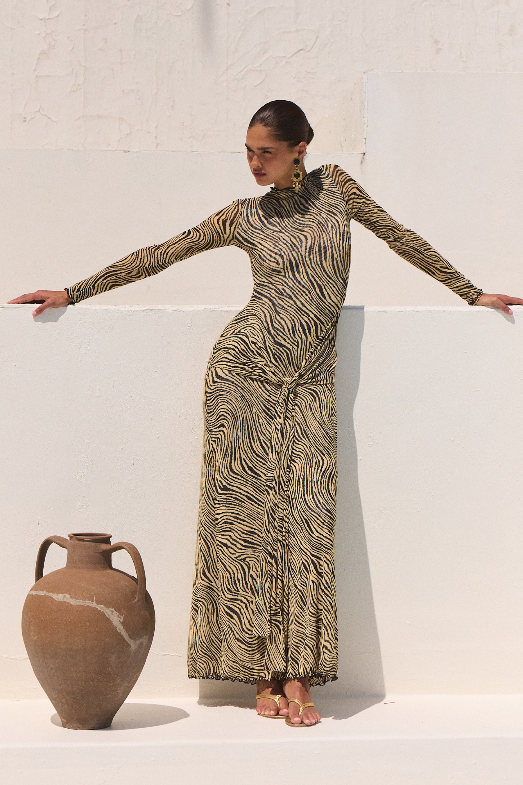 This is an image of Dani Dress in Birch - RESA featuring a model wearing the dress