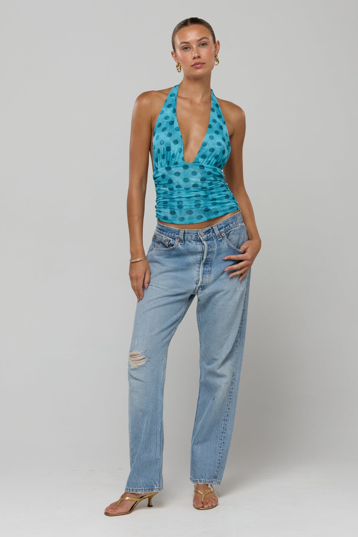 This is an image of Dena in Aquamarine - RESA featuring a model wearing the dress