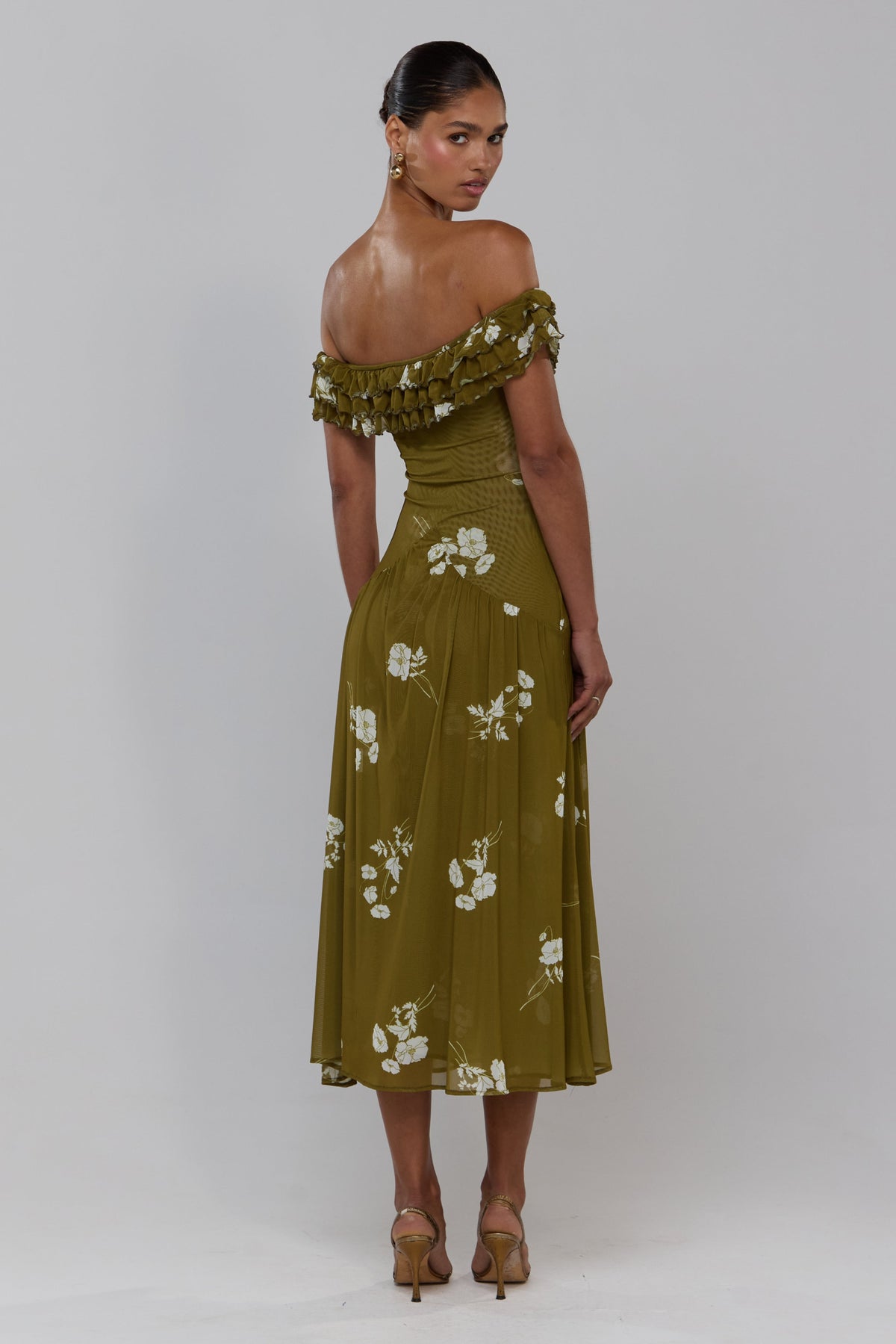This is an image of Dolly in Moss - RESA featuring a model wearing the dress