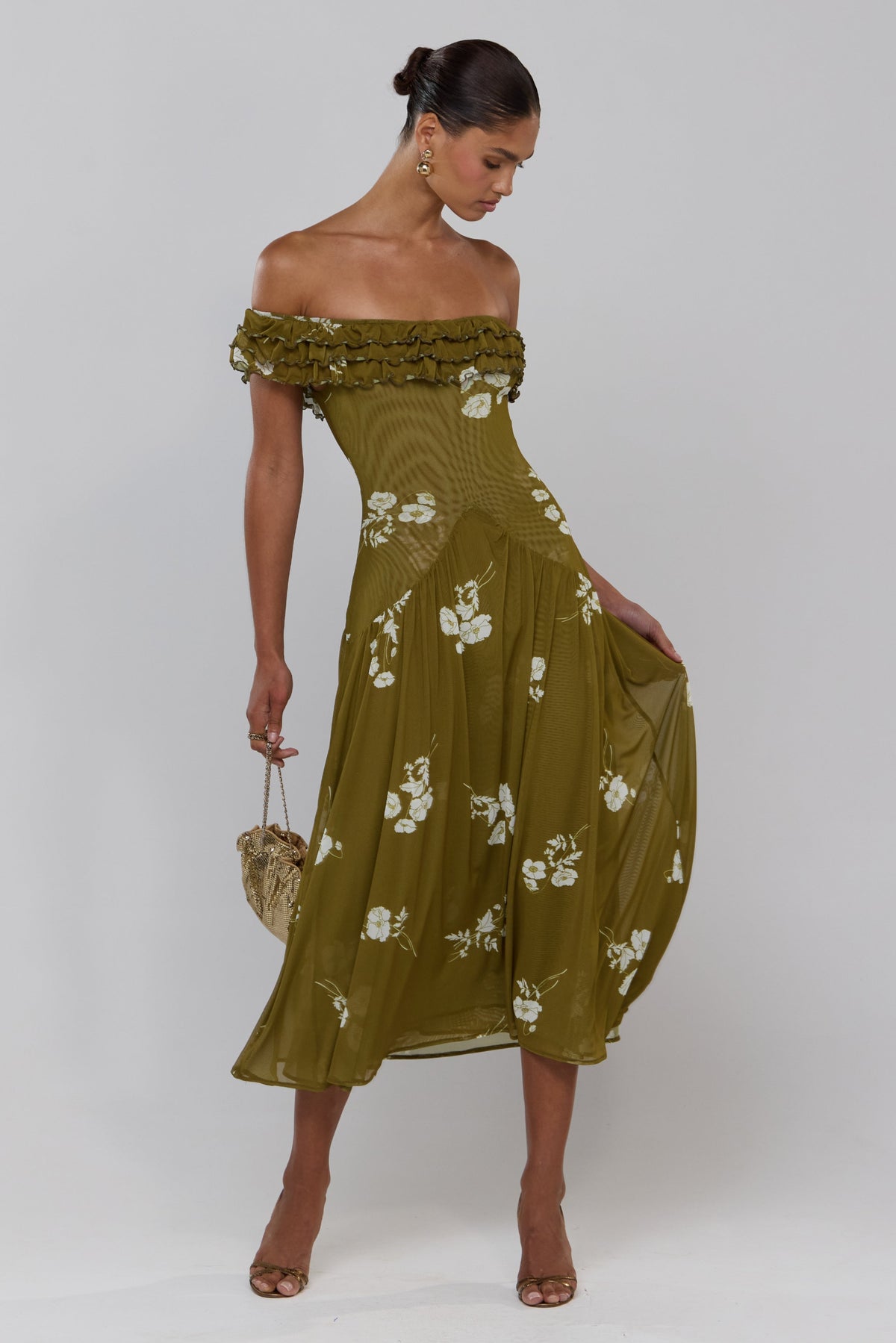 This is an image of Dolly in Moss - RESA featuring a model wearing the dress