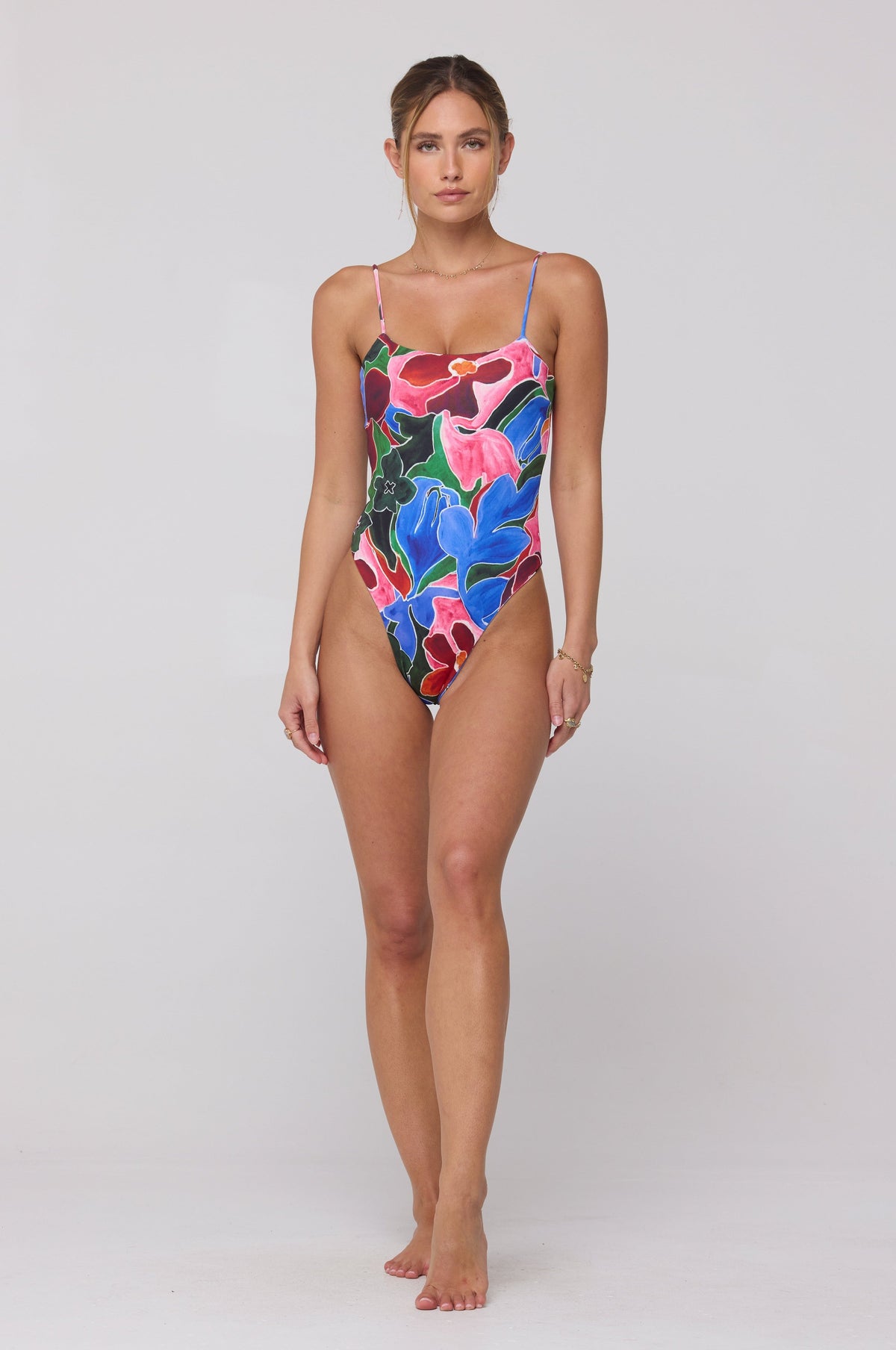 This is an image of Dominick One Piece Swimsuit in Ares - RESA featuring a model wearing the dress