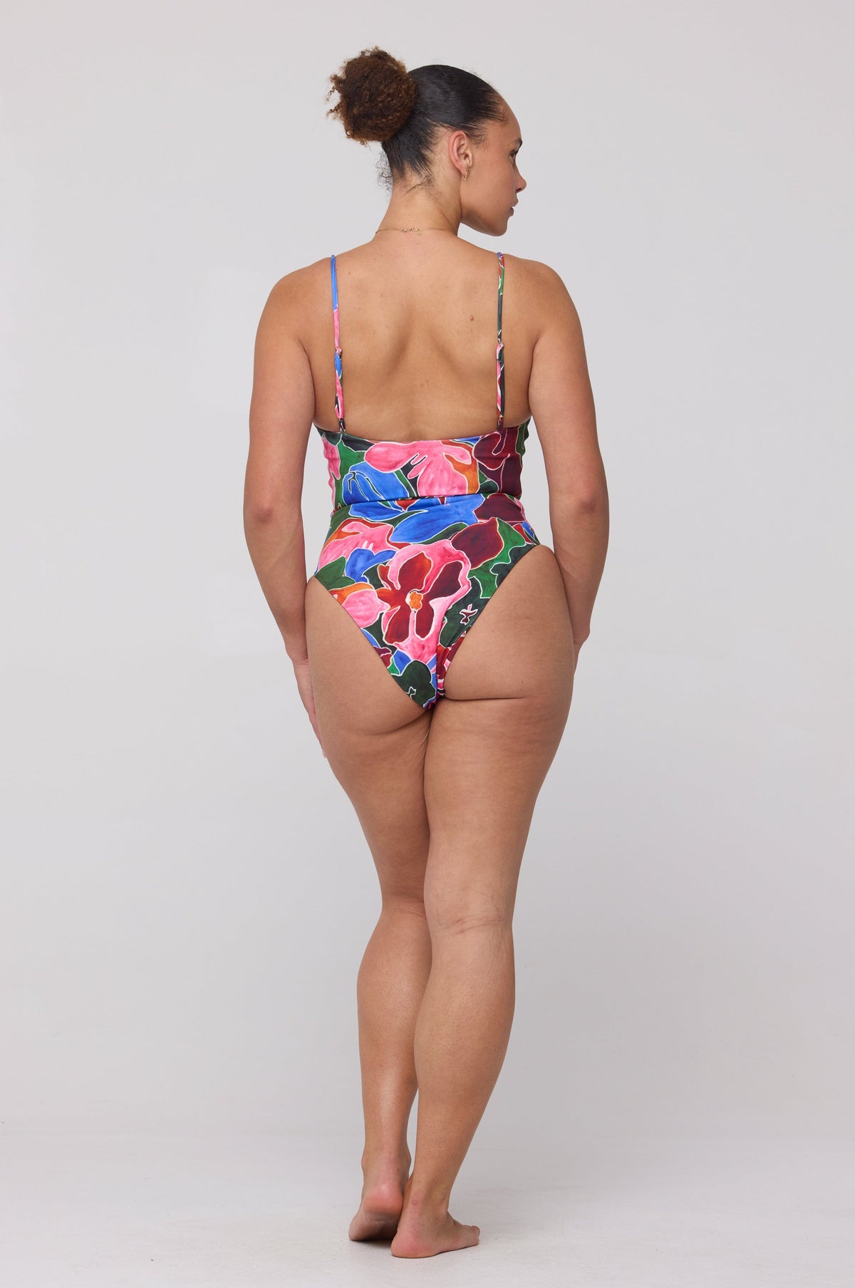 This is an image of Dominick One Piece Swimsuit in Ares - RESA featuring a model wearing the dress