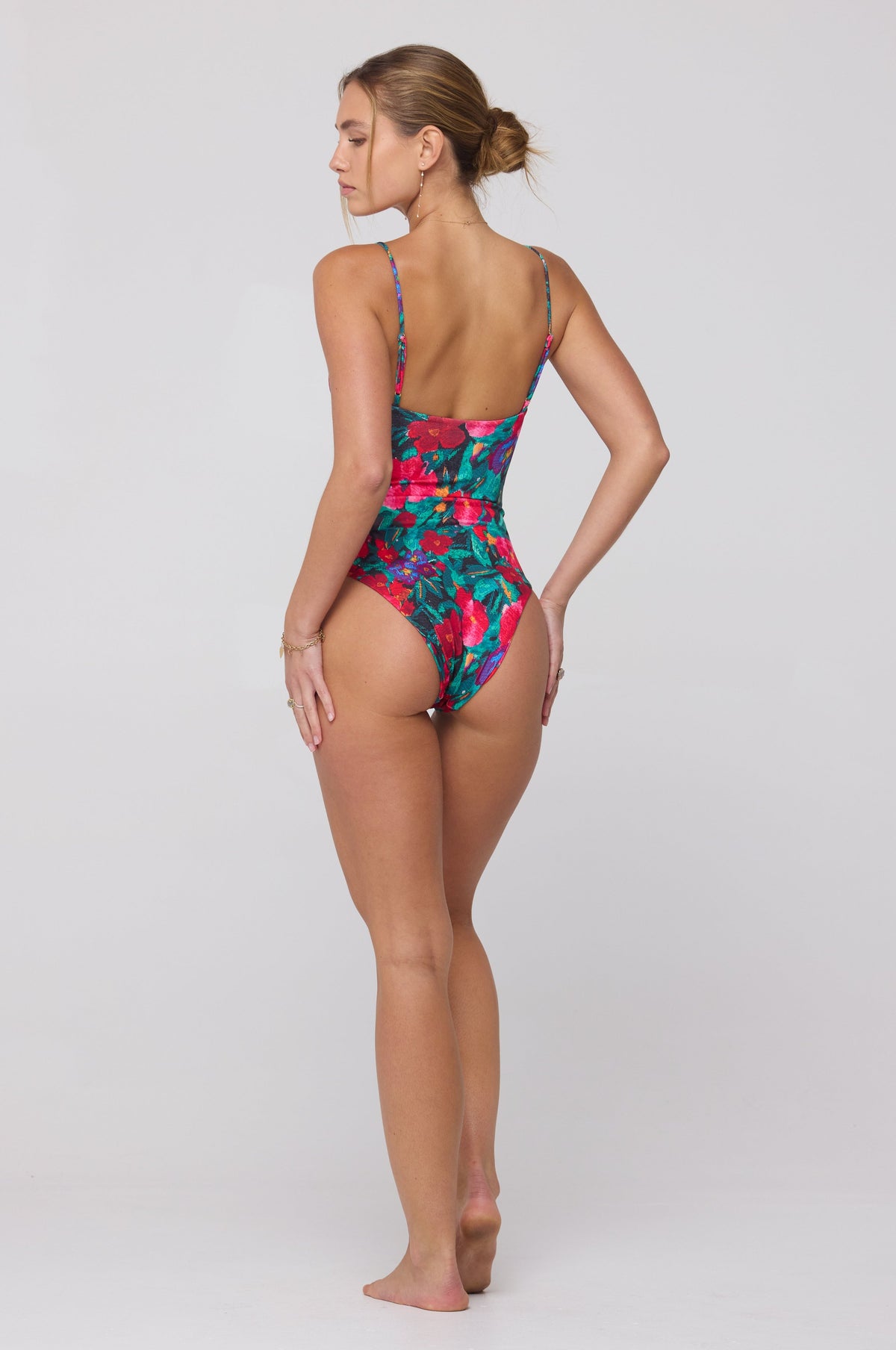 This is an image of Dominick One Piece Swimsuit in Resort - RESA featuring a model wearing the dress
