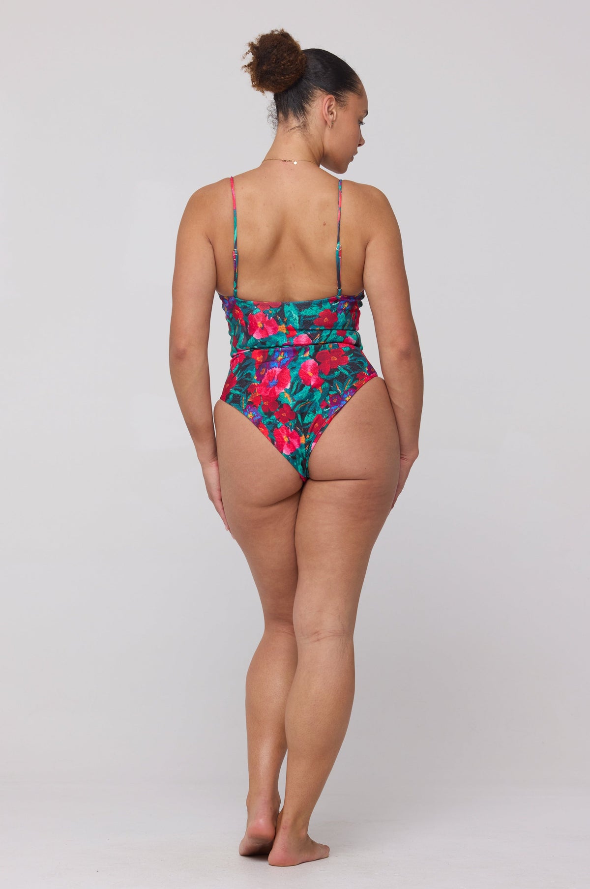 This is an image of Dominick One Piece Swimsuit in Resort - RESA featuring a model wearing the dress