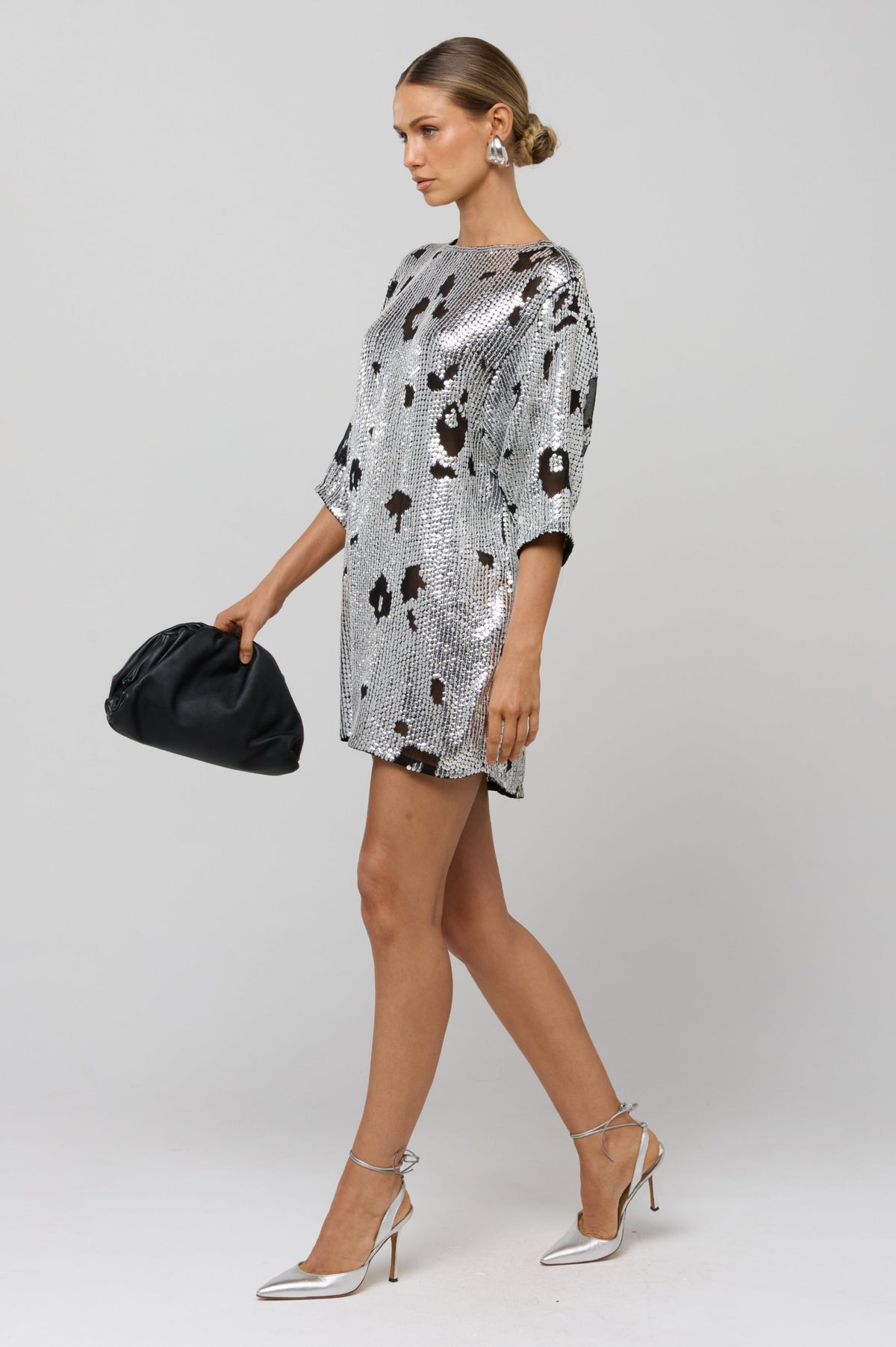 This is an image of Edie Sequin Dress - RESA featuring a model wearing the dress