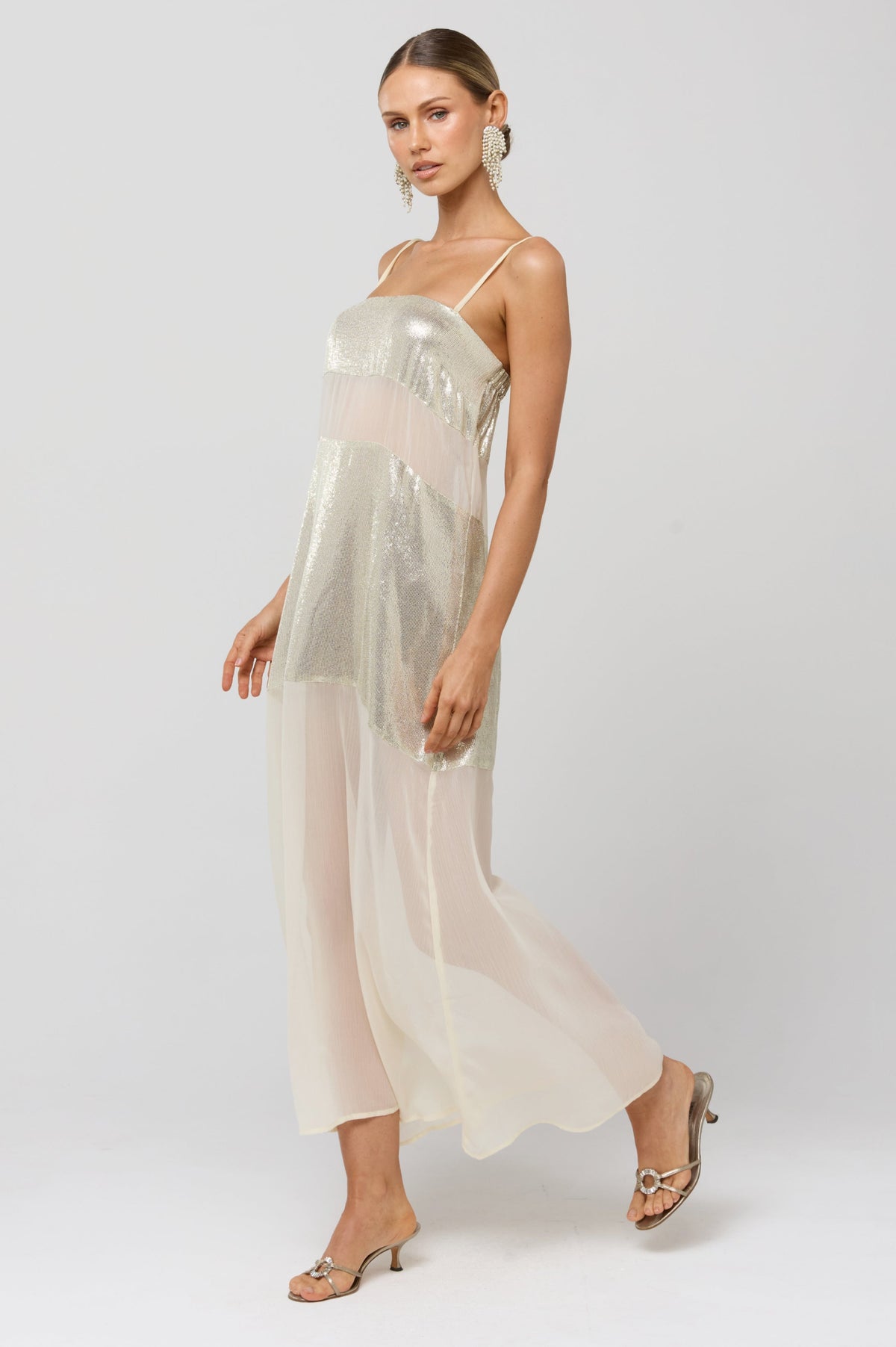 This is an image of Eli Gold Panel Dress - RESA featuring a model wearing the dress