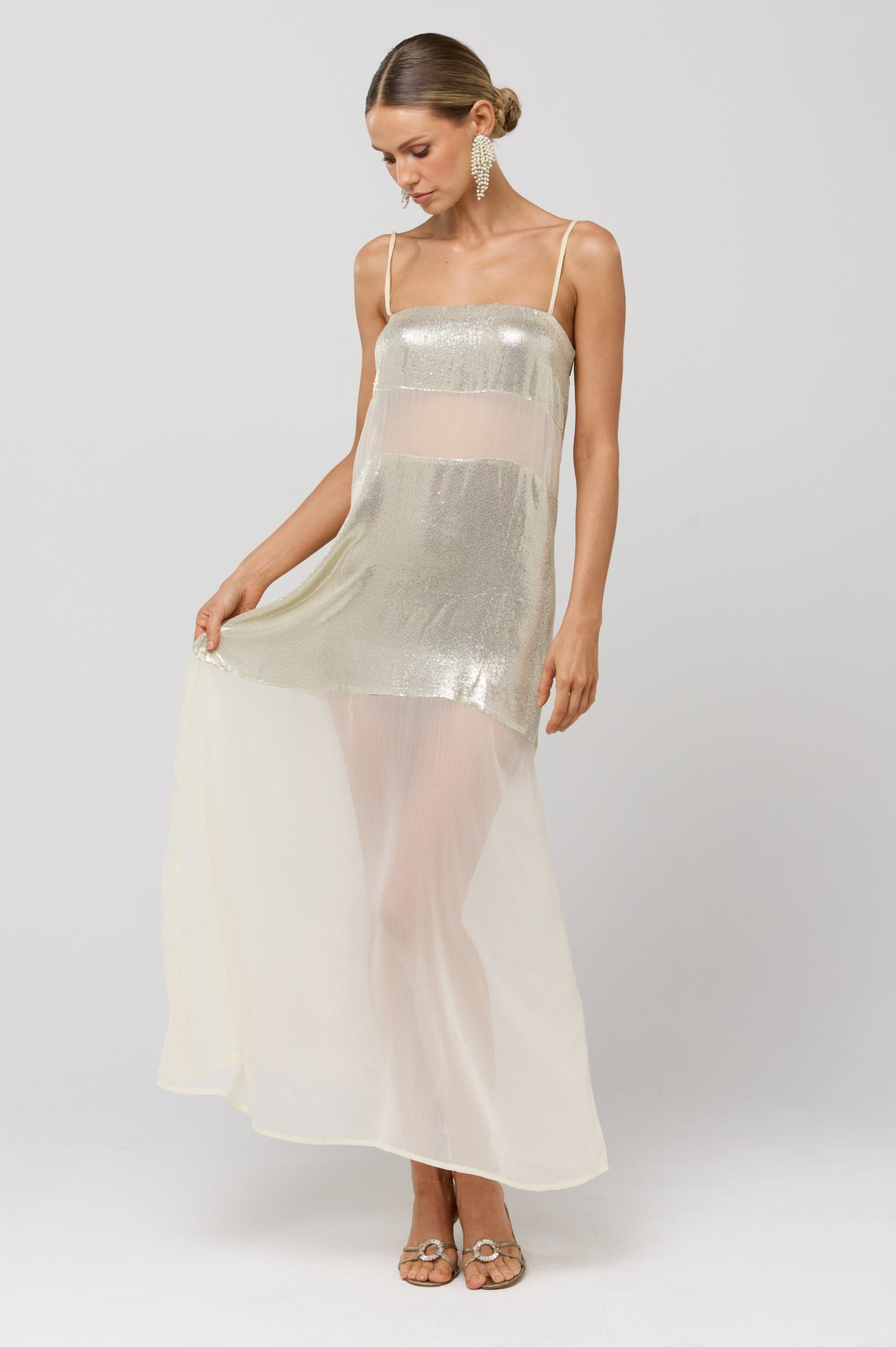 This is an image of Eli Gold Panel Dress - RESA featuring a model wearing the dress