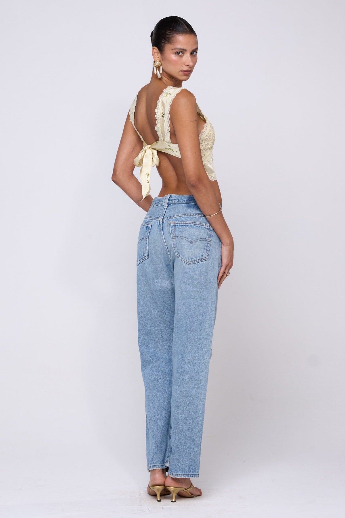 This is an image of Eloise Top in Beurre - RESA featuring a model wearing the dress