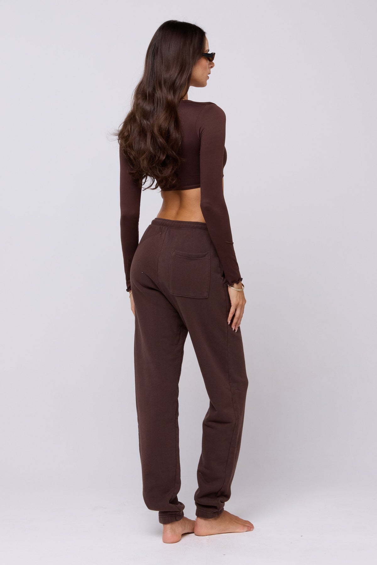 This is an image of Emily Top in Chocolate - RESA featuring a model wearing the dress