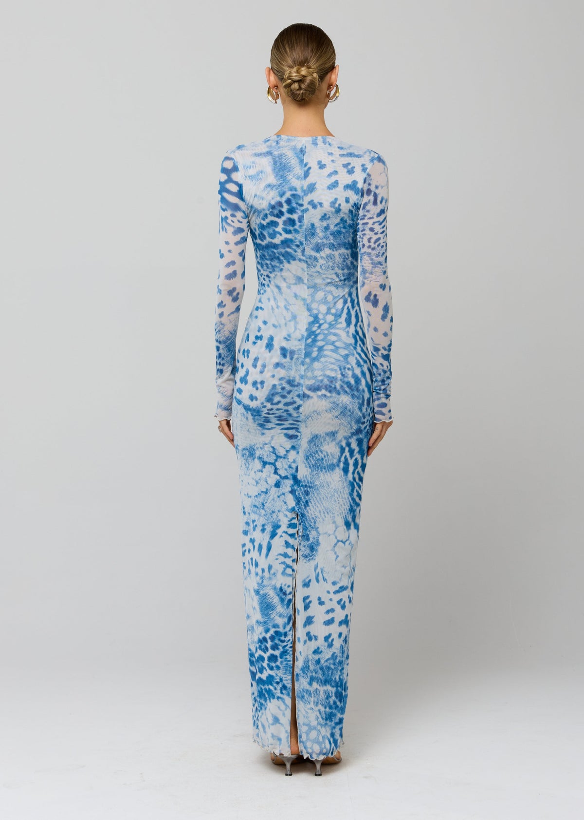 This is an image of Esme Dress in Neve - RESA featuring a model wearing the dress