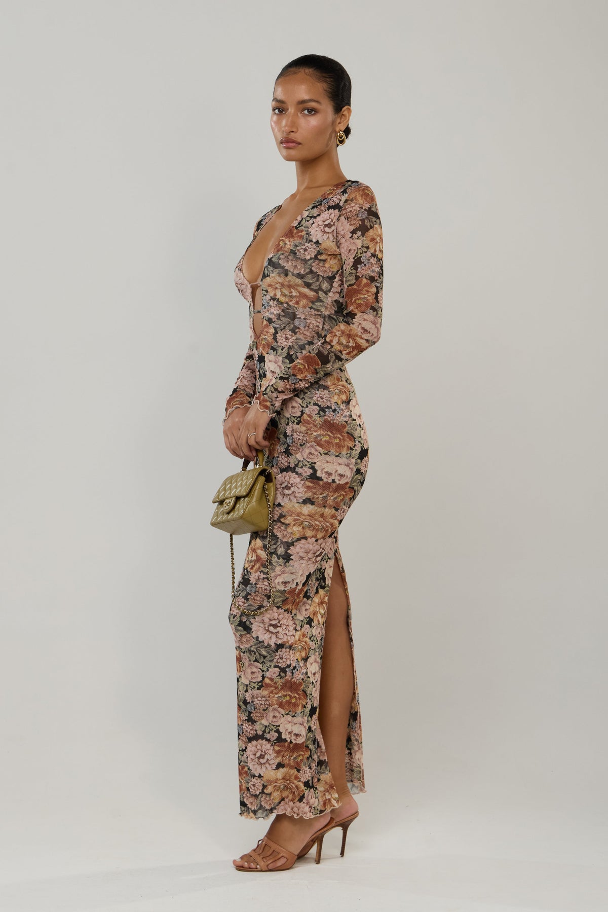 This is an image of Esme in Antique - RESA featuring a model wearing the dress