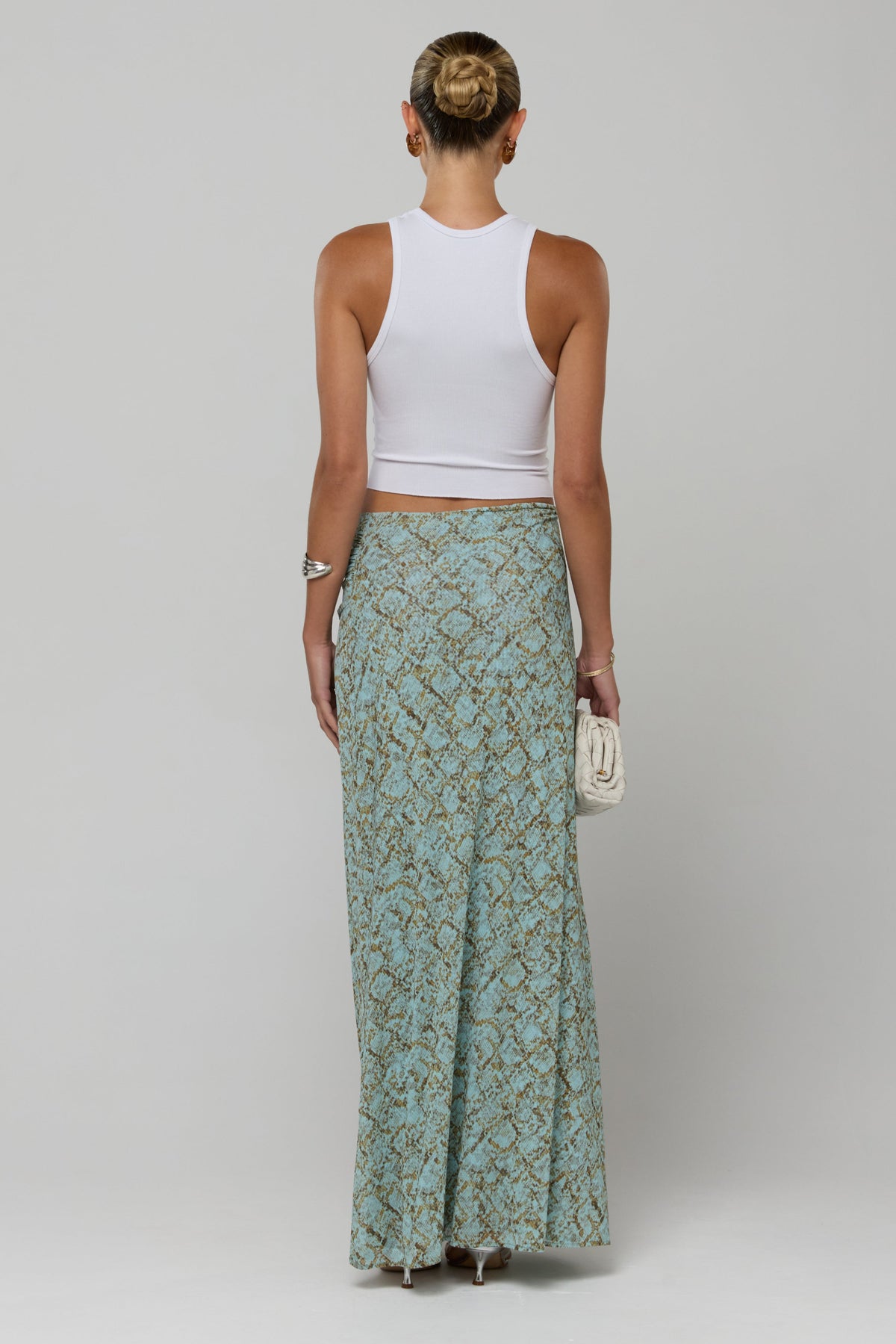 This is an image of Estelle Skirt in Azura - RESA featuring a model wearing the dress