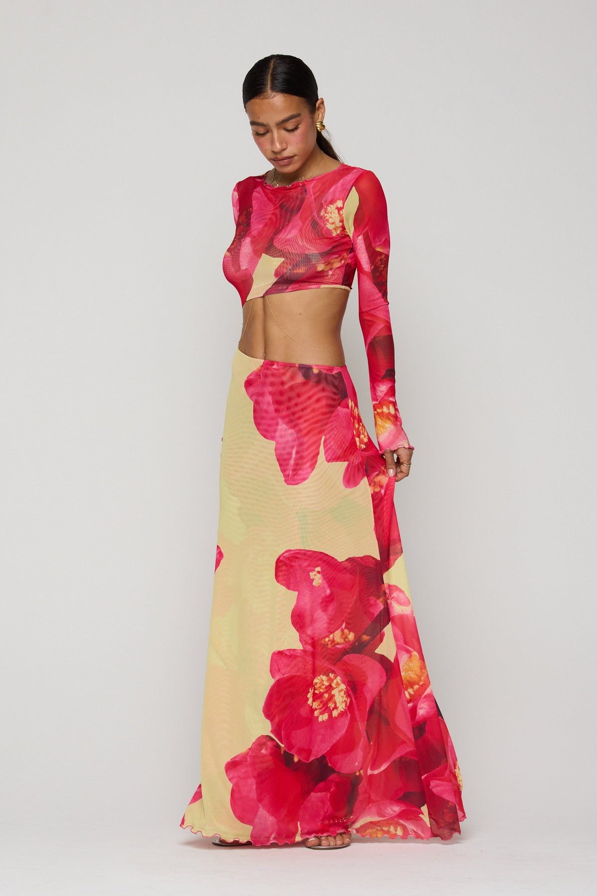 This is an image of Eva Maxi in Crawford - RESA featuring a model wearing the dress