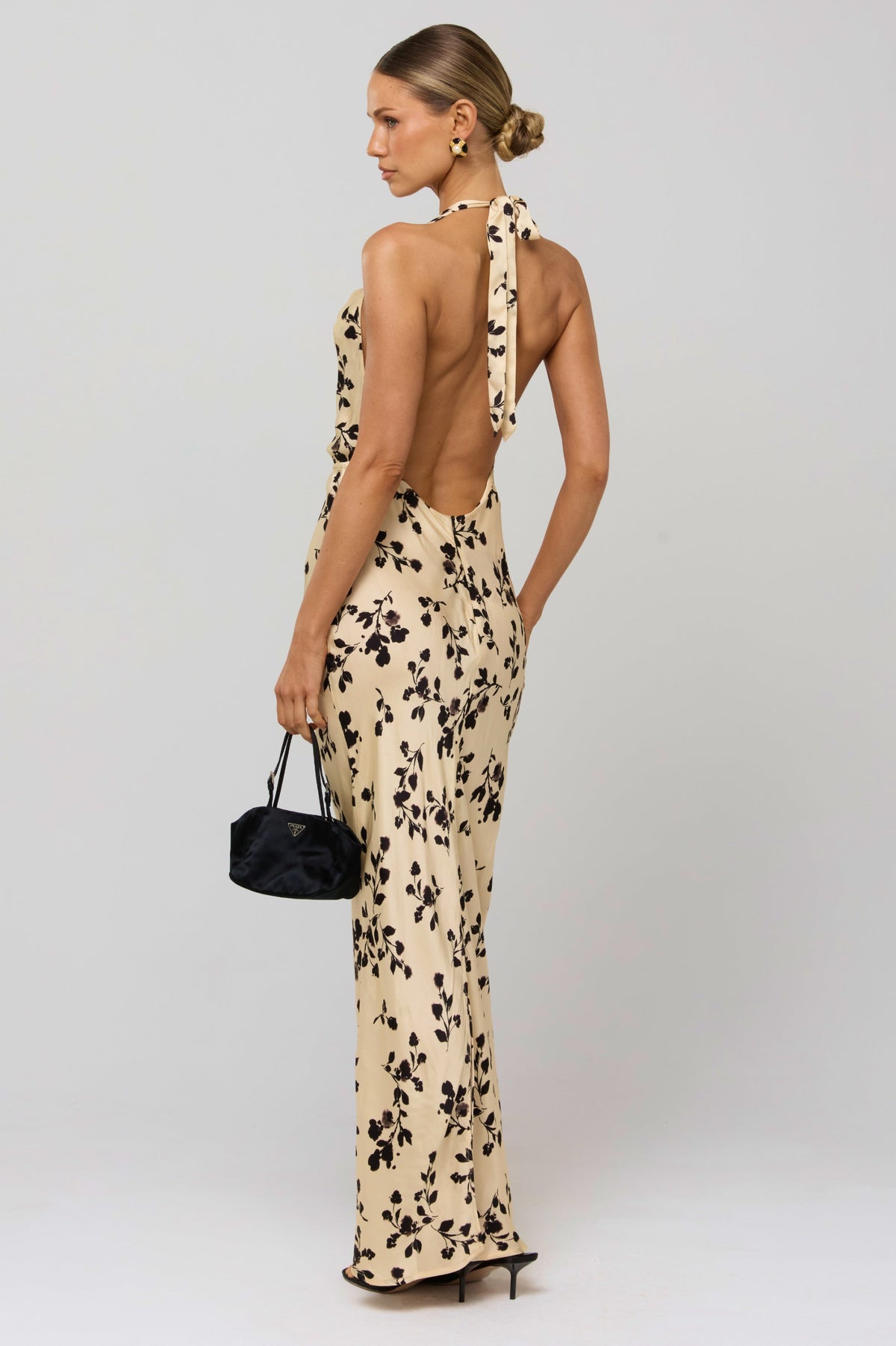 This is an image of Fiona Dress in Black Dahlia - RESA featuring a model wearing the dress