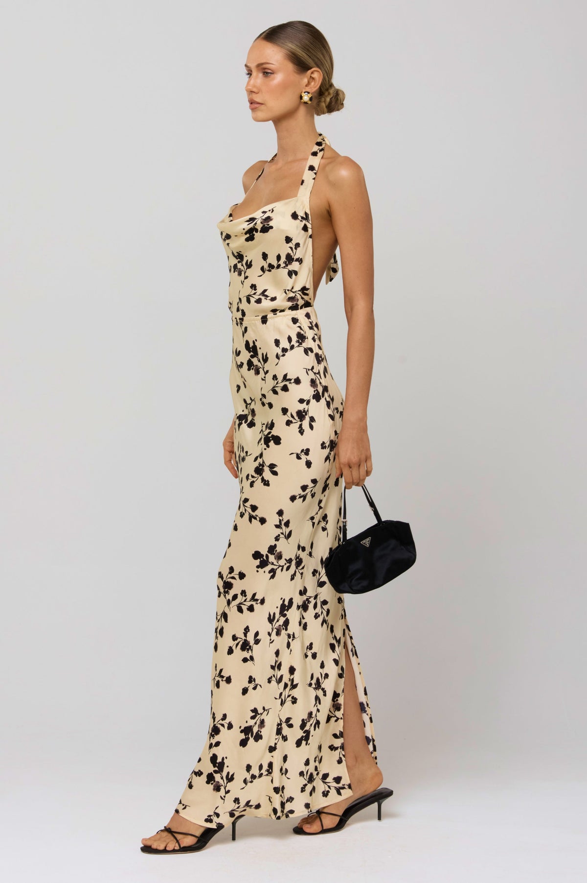 This is an image of Fiona Dress in Black Dahlia - RESA featuring a model wearing the dress