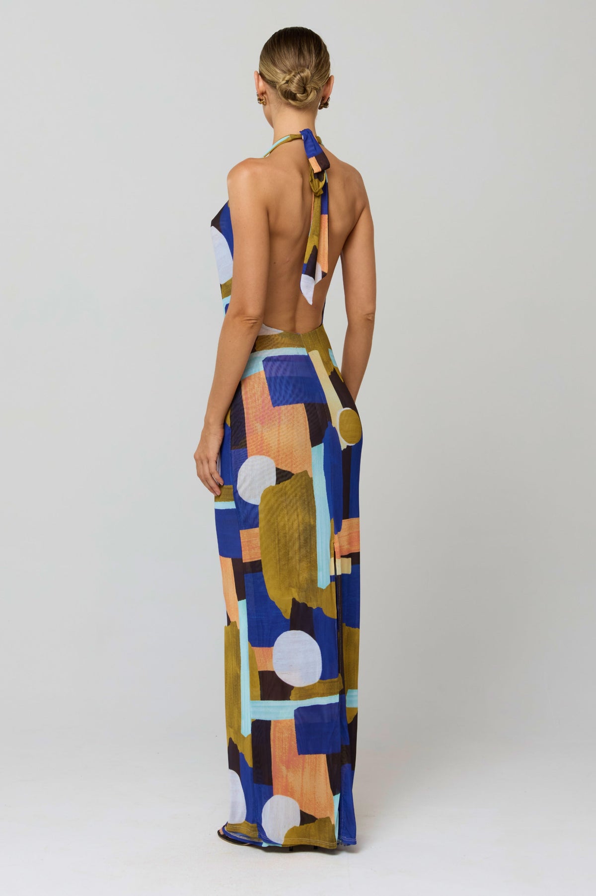 This is an image of Fiona Dress in Deco - RESA featuring a model wearing the dress