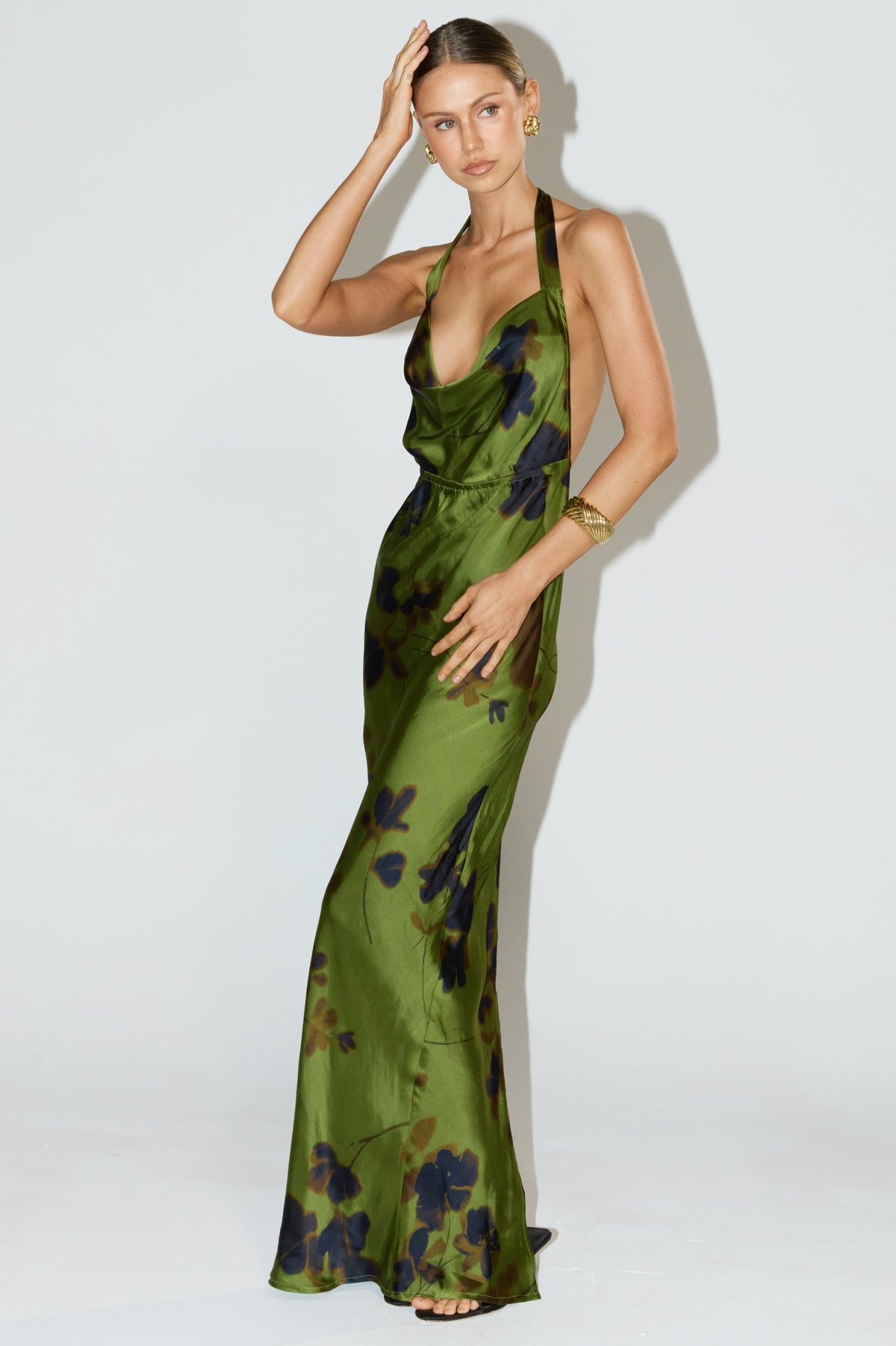 This is an image of Fiona Dress in Evergreen - RESA featuring a model wearing the dress