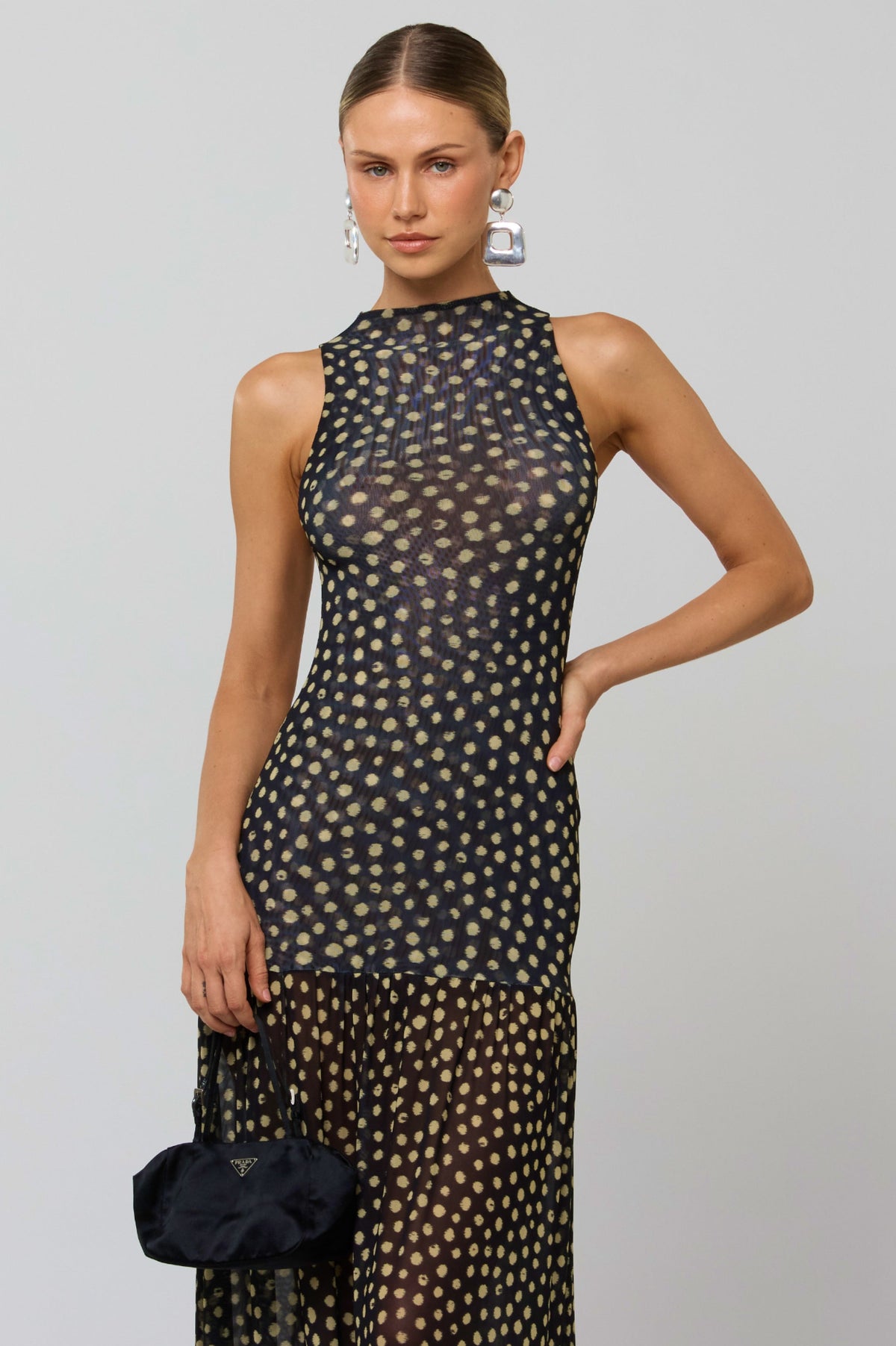 This is an image of Frida Dress in Celeste - RESA featuring a model wearing the dress