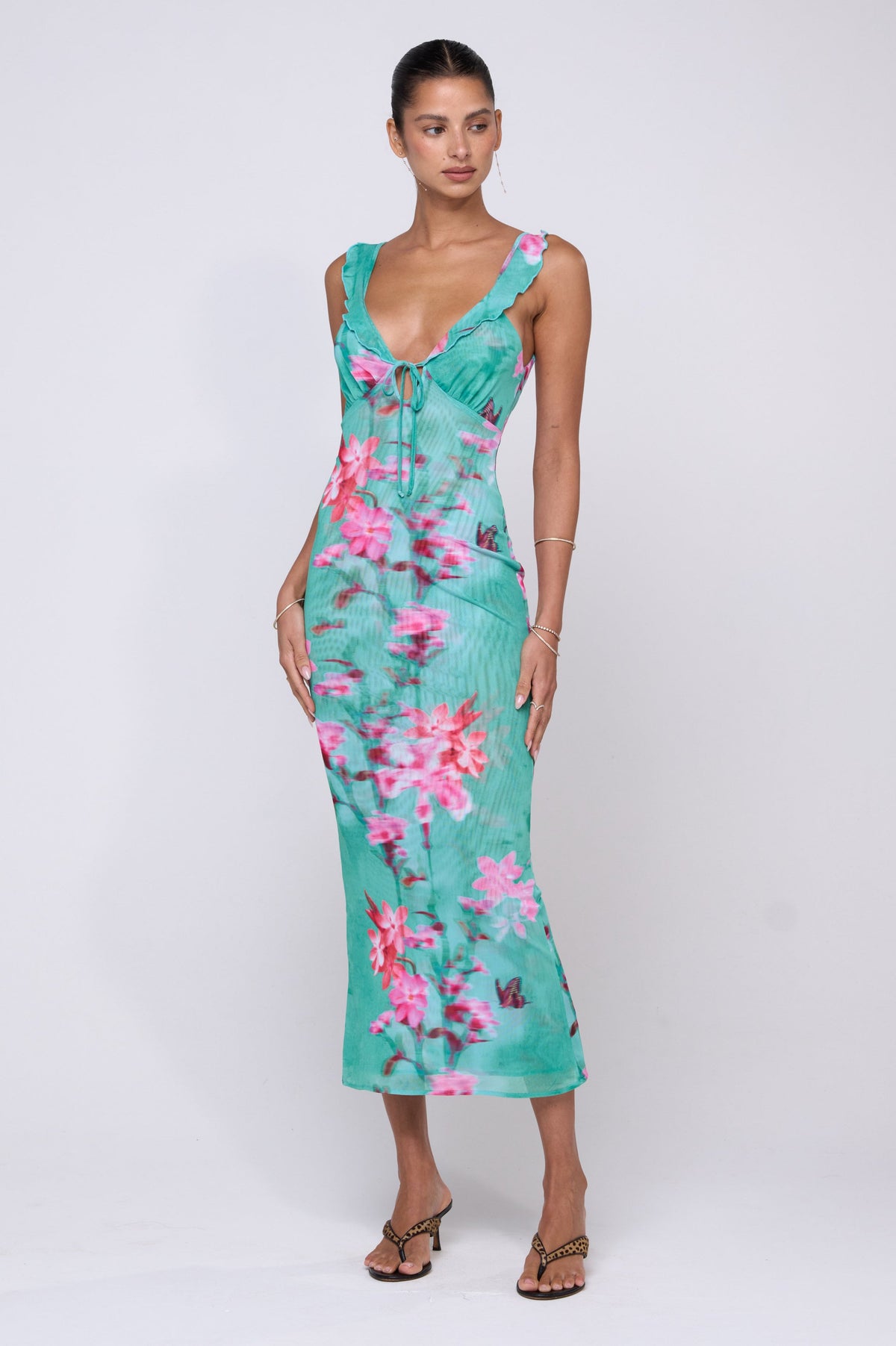 This is an image of Goldie Dress in Clearwater - RESA featuring a model wearing the dress