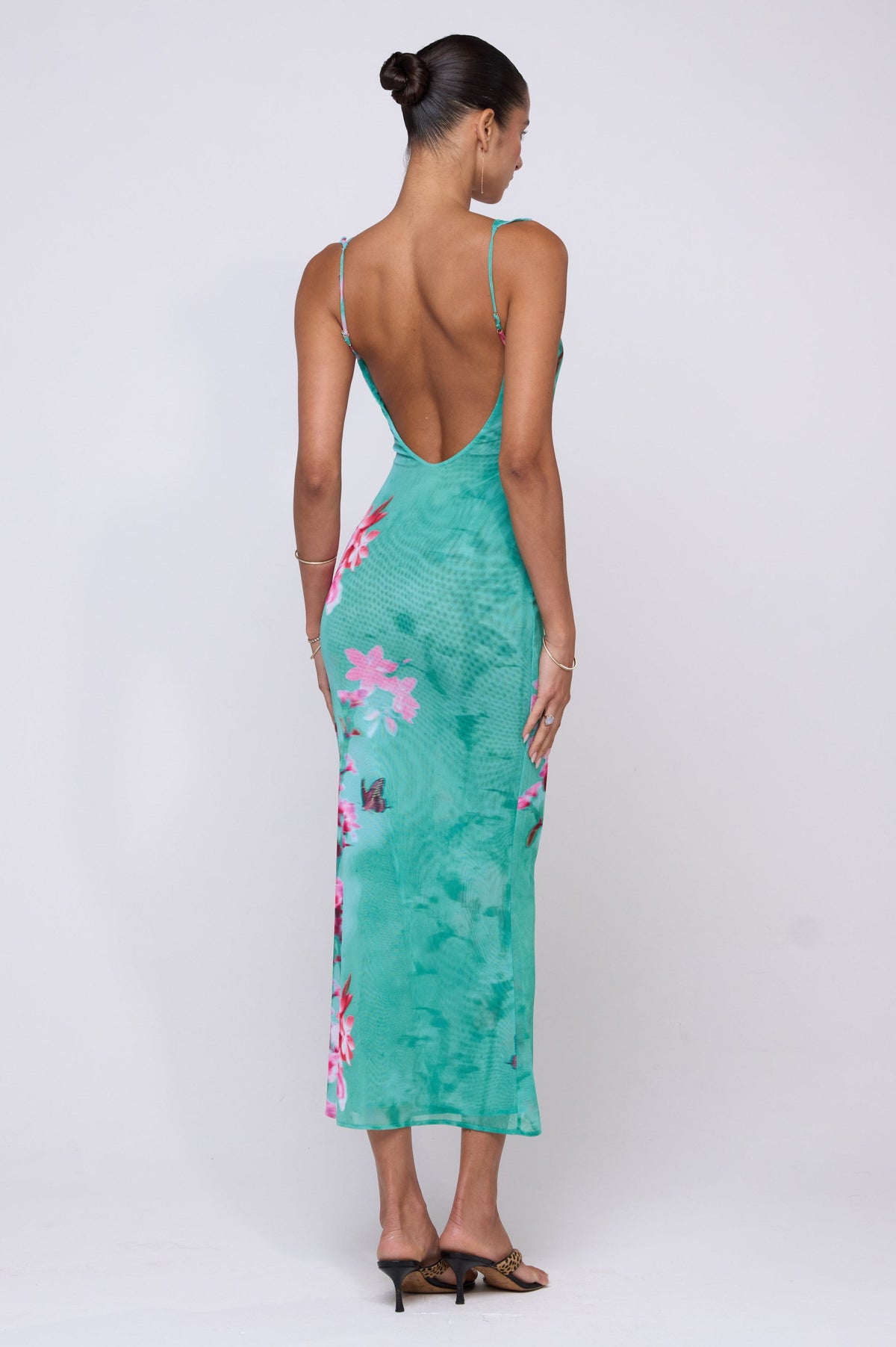 This is an image of Goldie Dress in Clearwater - RESA featuring a model wearing the dress