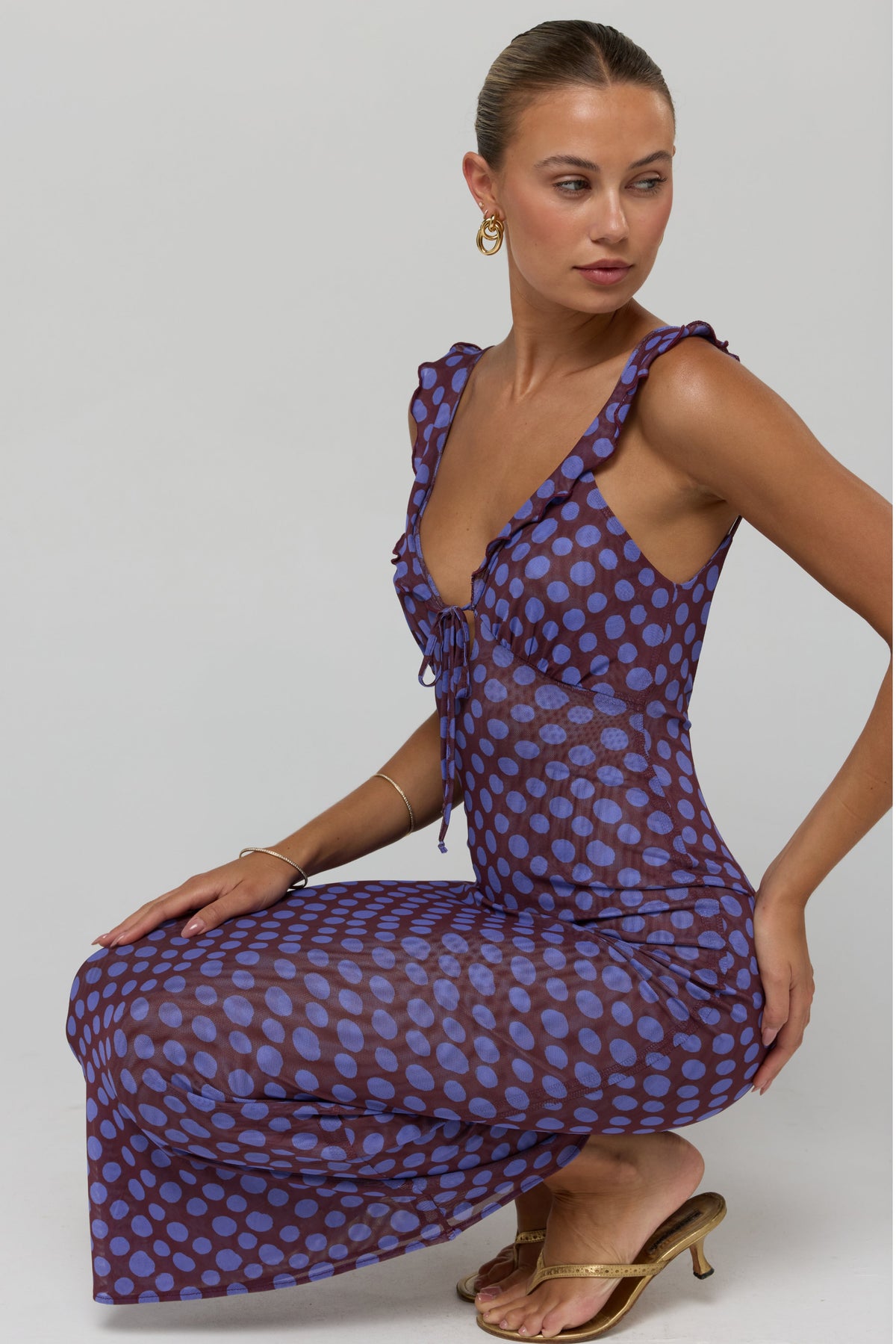 This is an image of Goldie in Vino - RESA featuring a model wearing the dress