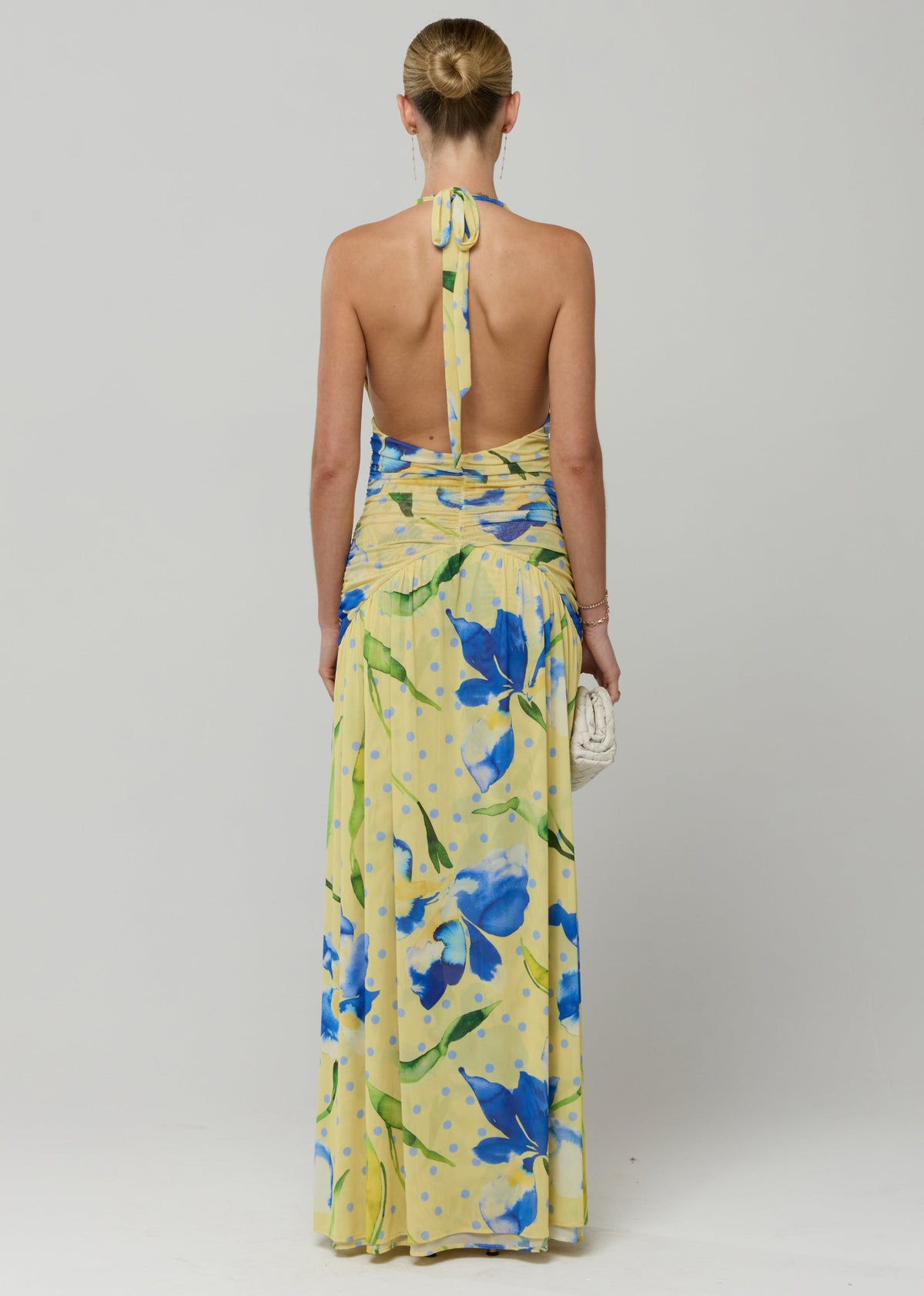 This is an image of Grace Maxi in Solei - RESA featuring a model wearing the dress