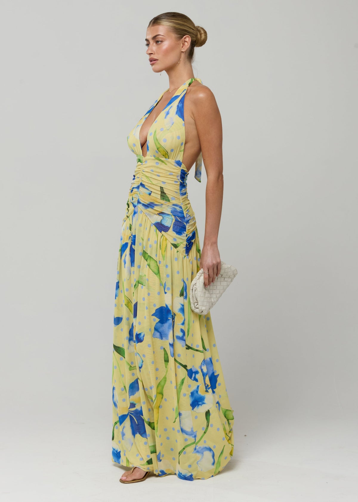 This is an image of Grace Maxi in Solei - RESA featuring a model wearing the dress