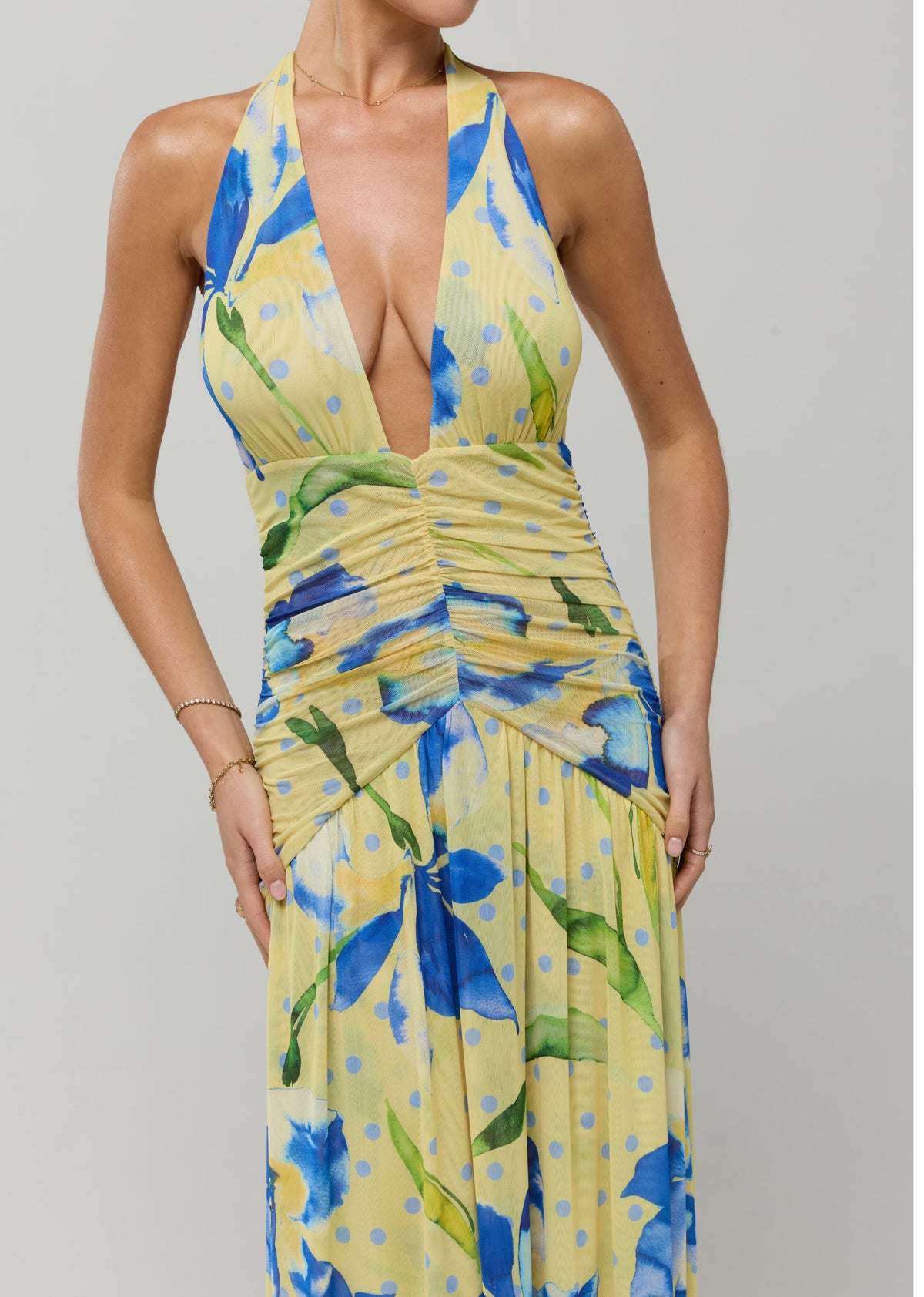 This is an image of Grace Maxi in Solei - RESA featuring a model wearing the dress