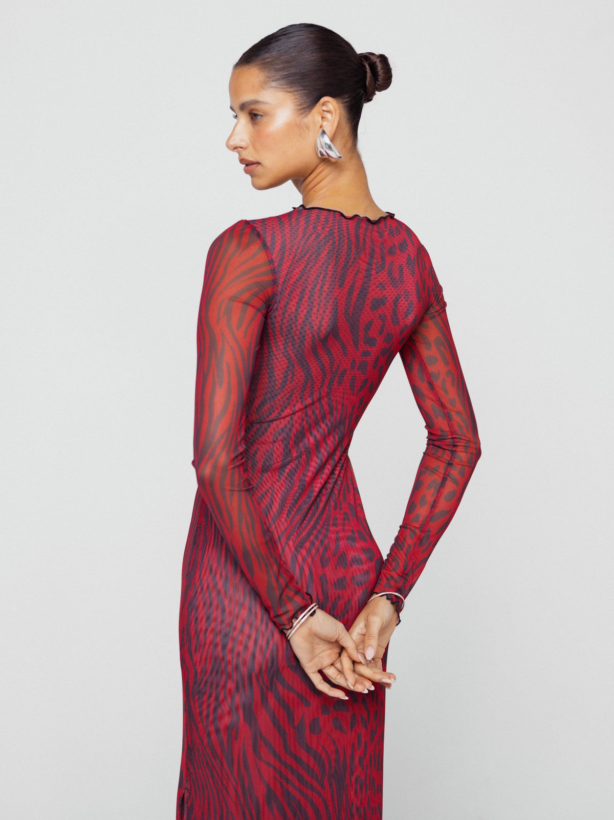 This is an image of Holly Maxi in Vixen - RESA featuring a model wearing the dress