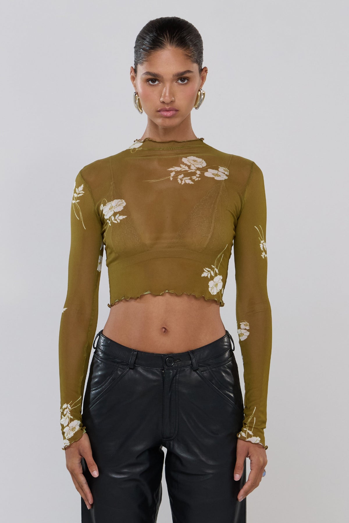This is an image of Ida in Moss - RESA featuring a model wearing the dress