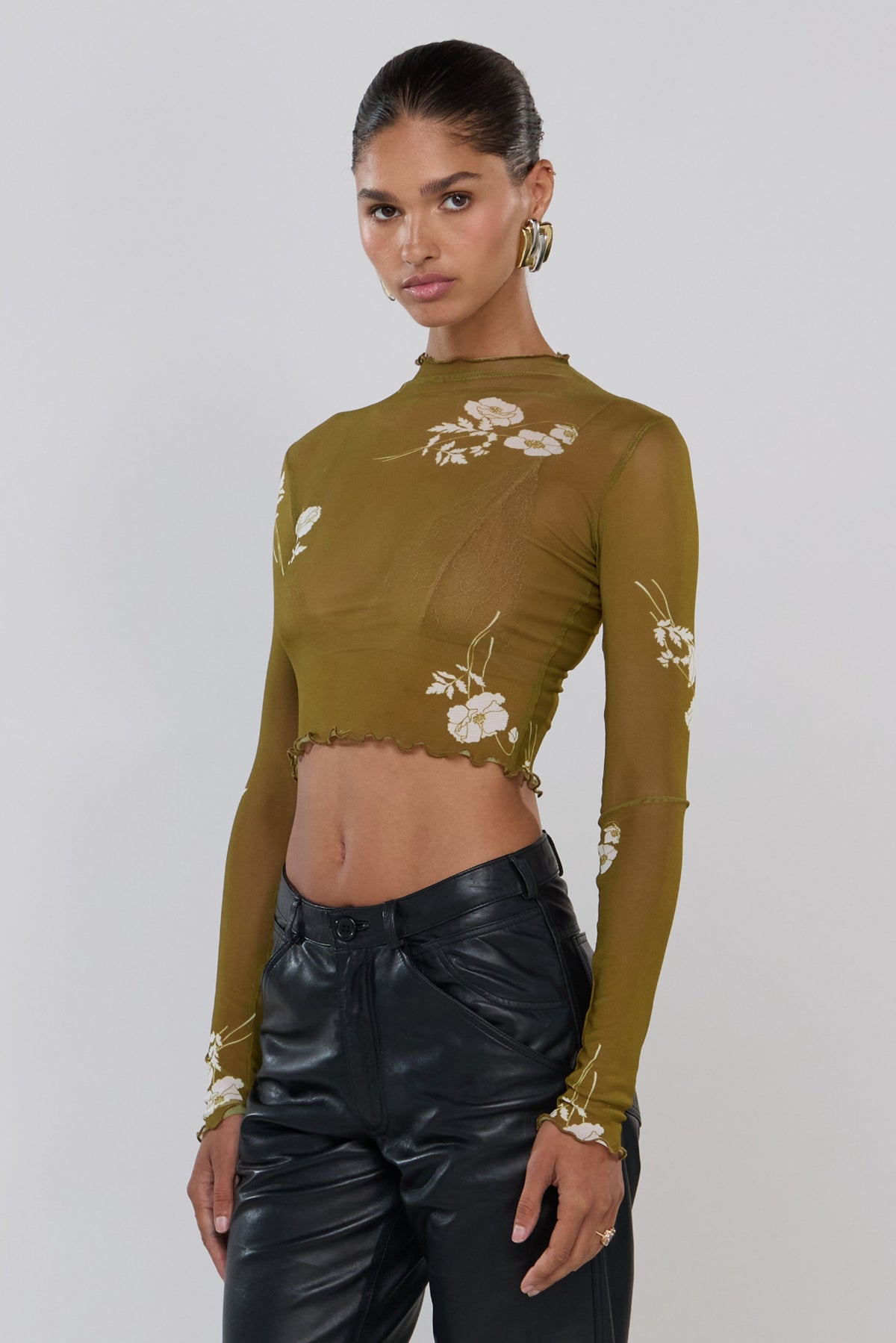 This is an image of Ida in Moss - RESA featuring a model wearing the dress