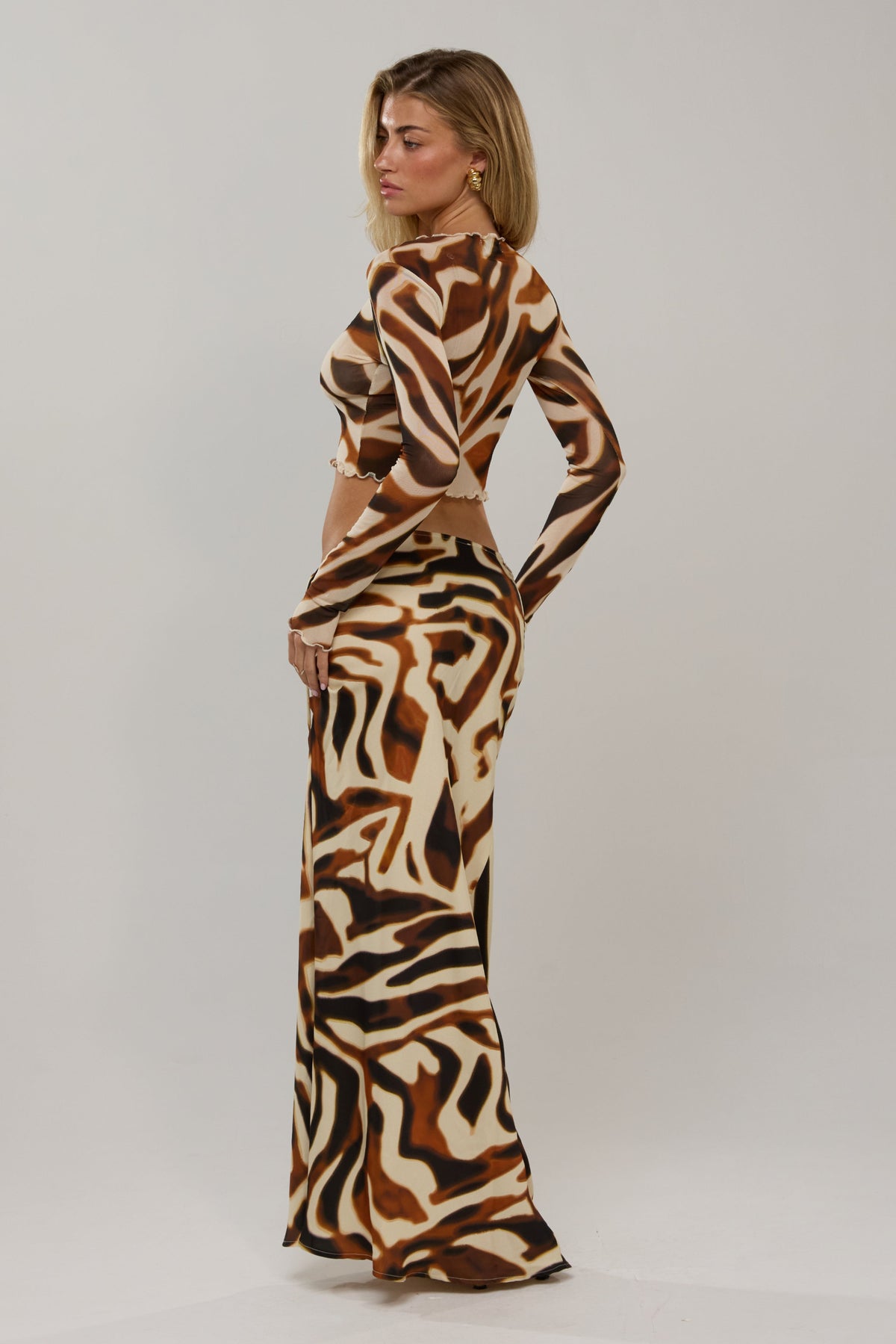 This is an image of Ida in Rye - RESA featuring a model wearing the dress