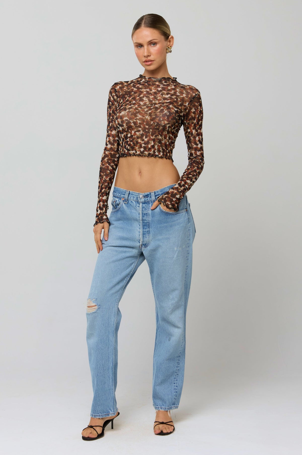 This is an image of Ida Top in Terra - RESA featuring a model wearing the dress