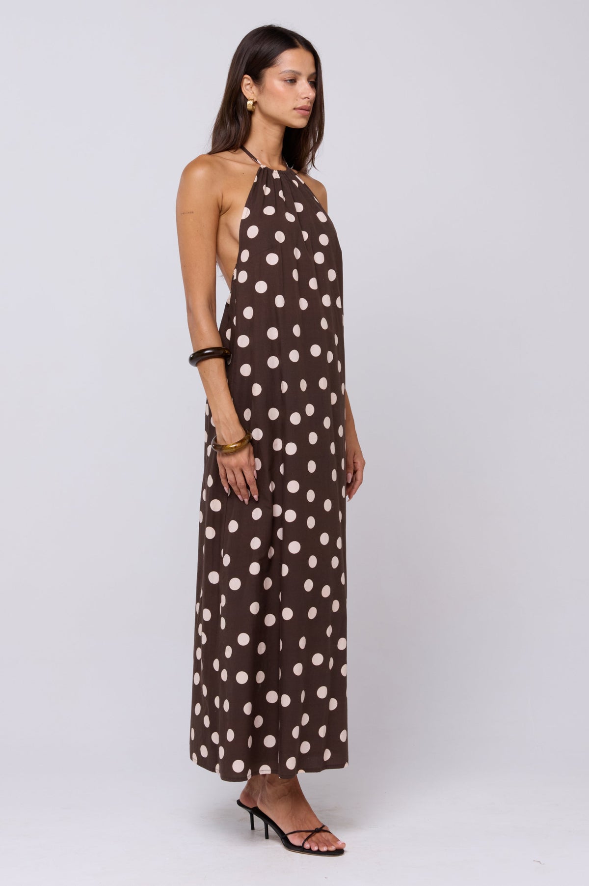 This is an image of Iris Halter Dress in Polo - RESA featuring a model wearing the dress