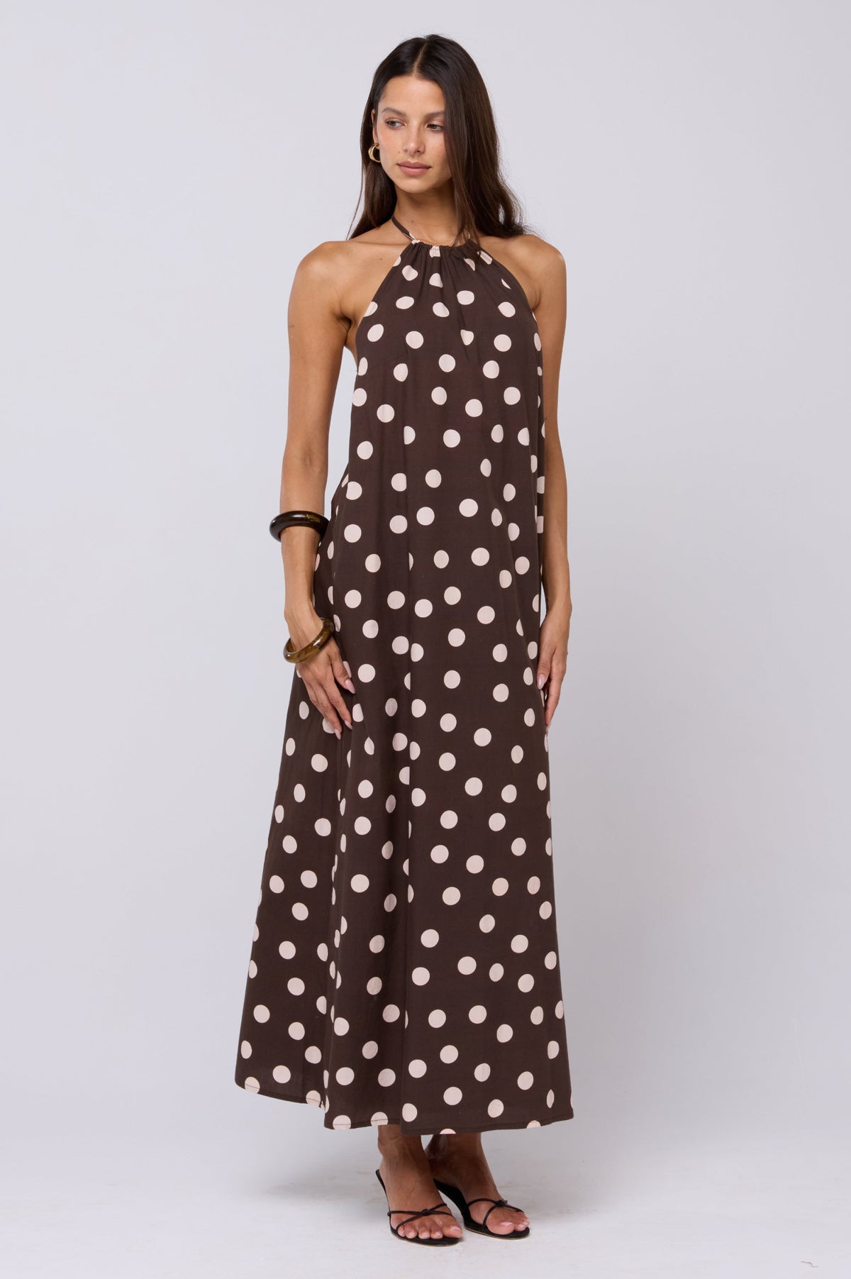 This is an image of Iris Halter Dress in Polo - RESA featuring a model wearing the dress