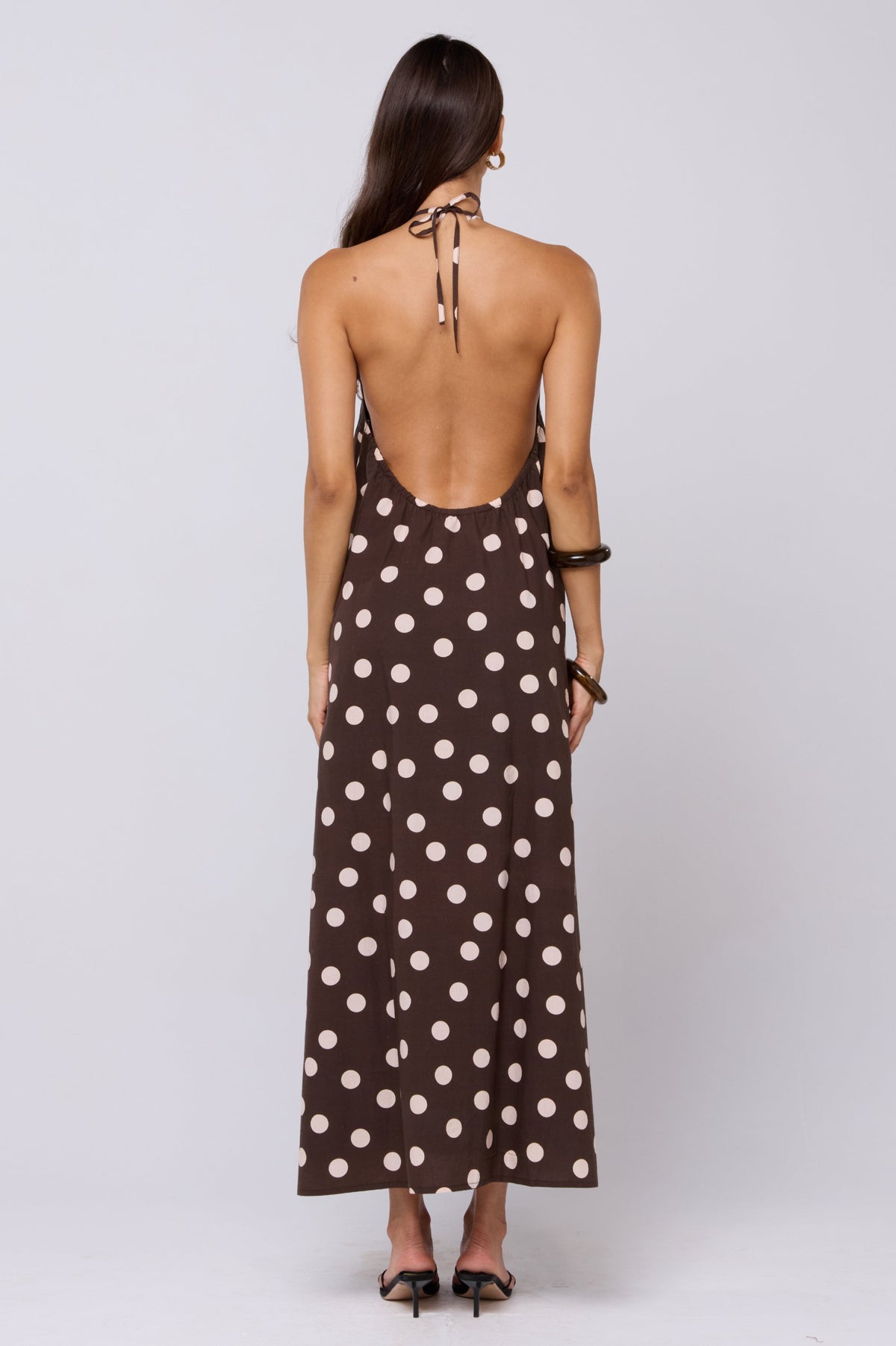 This is an image of Iris Halter Dress in Polo - RESA featuring a model wearing the dress