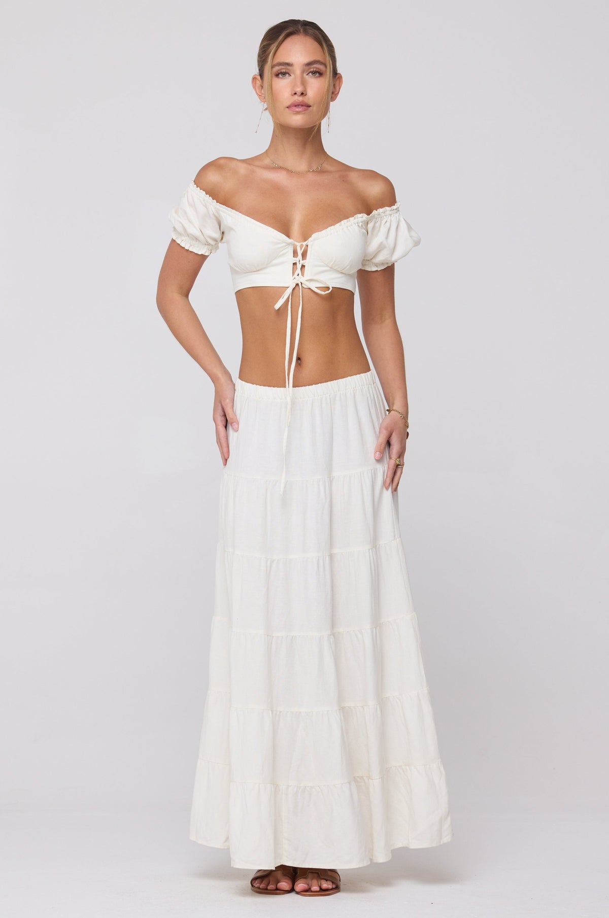 This is an image of Jess Top in White Linen - RESA featuring a model wearing the dress