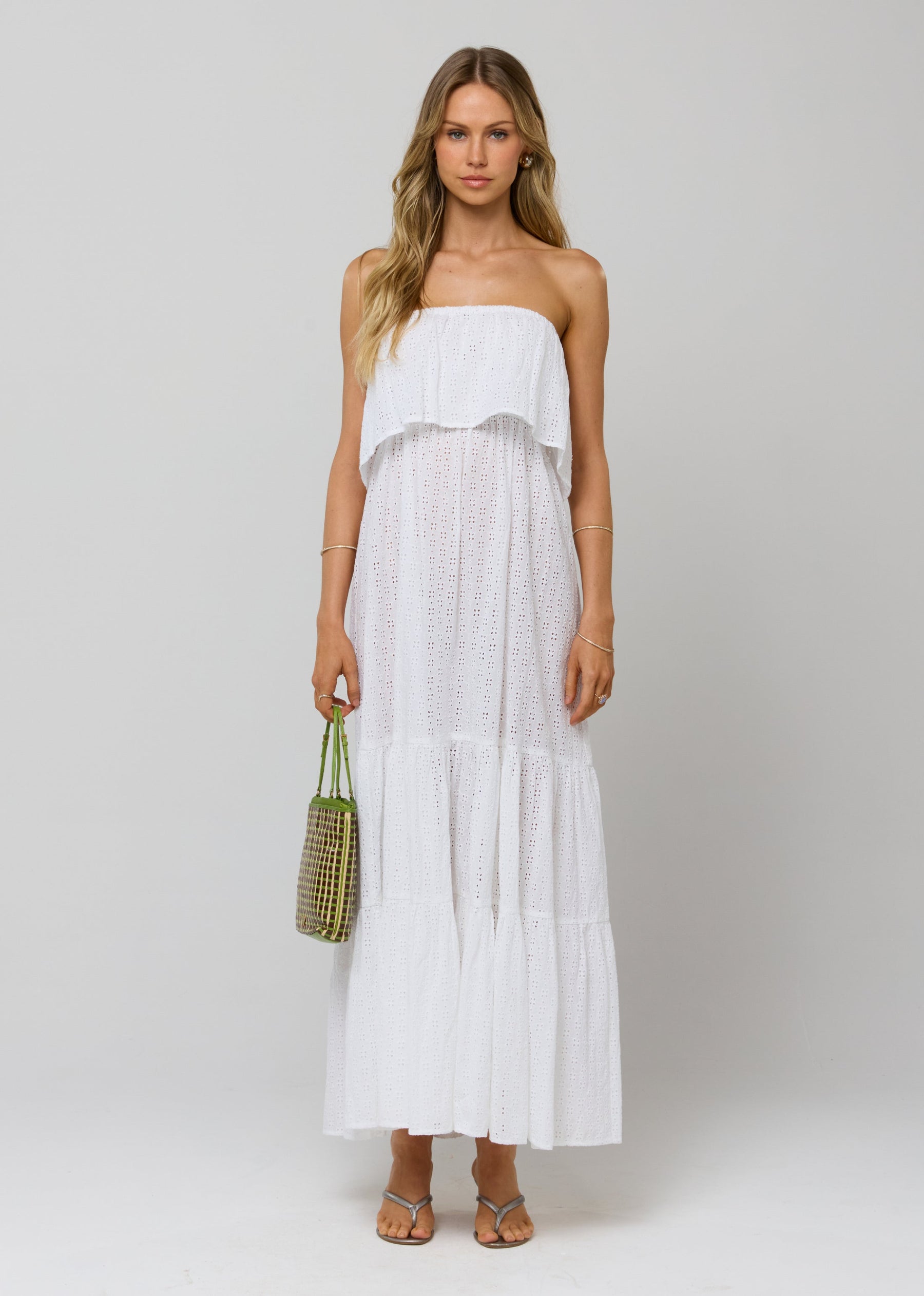 This is an image of Joni Dress in White Eyelet - RESA featuring a model wearing the dress