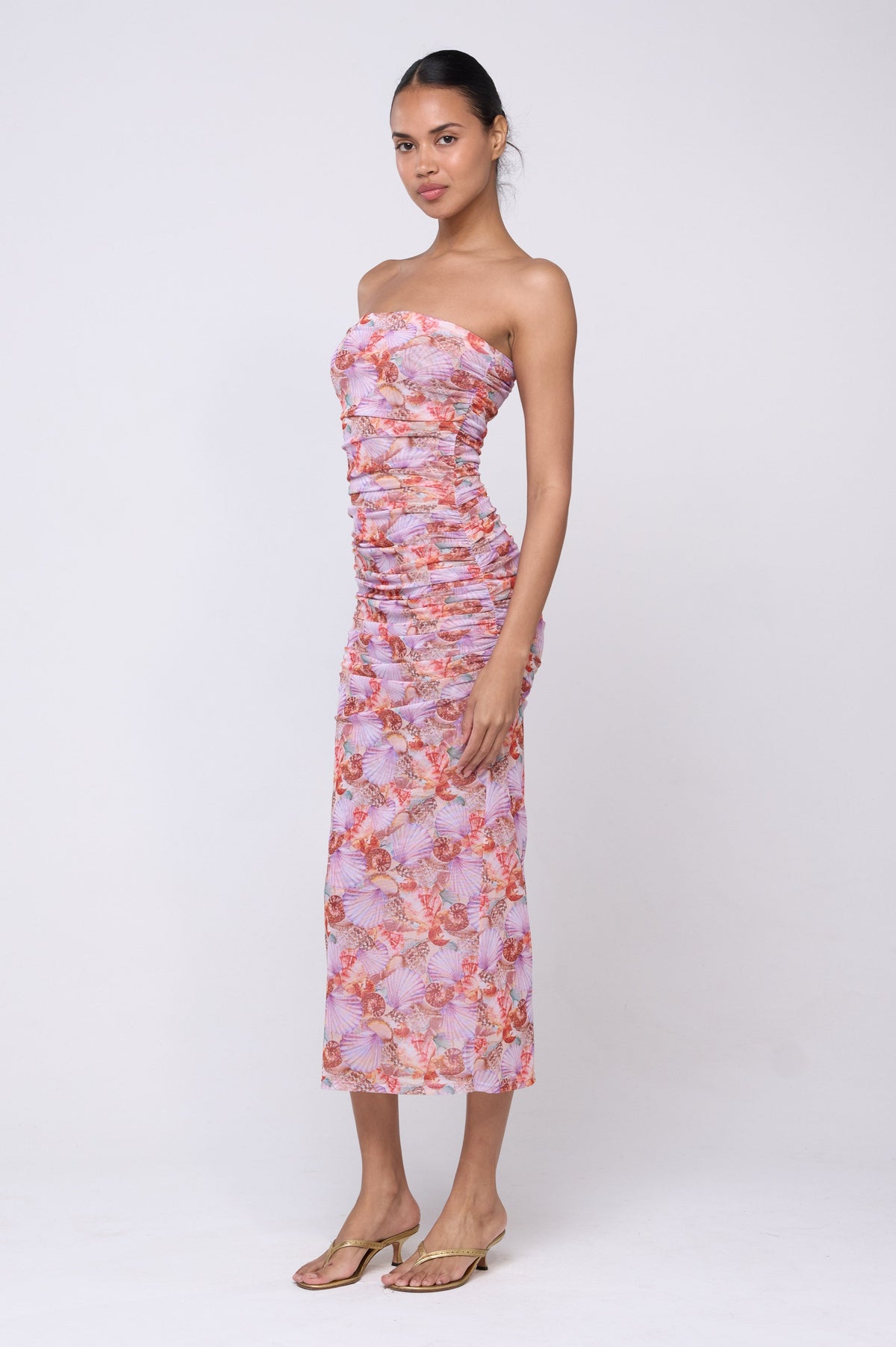 This is an image of Kristina Dress in Coral - Archive - RESA featuring a model wearing the dress