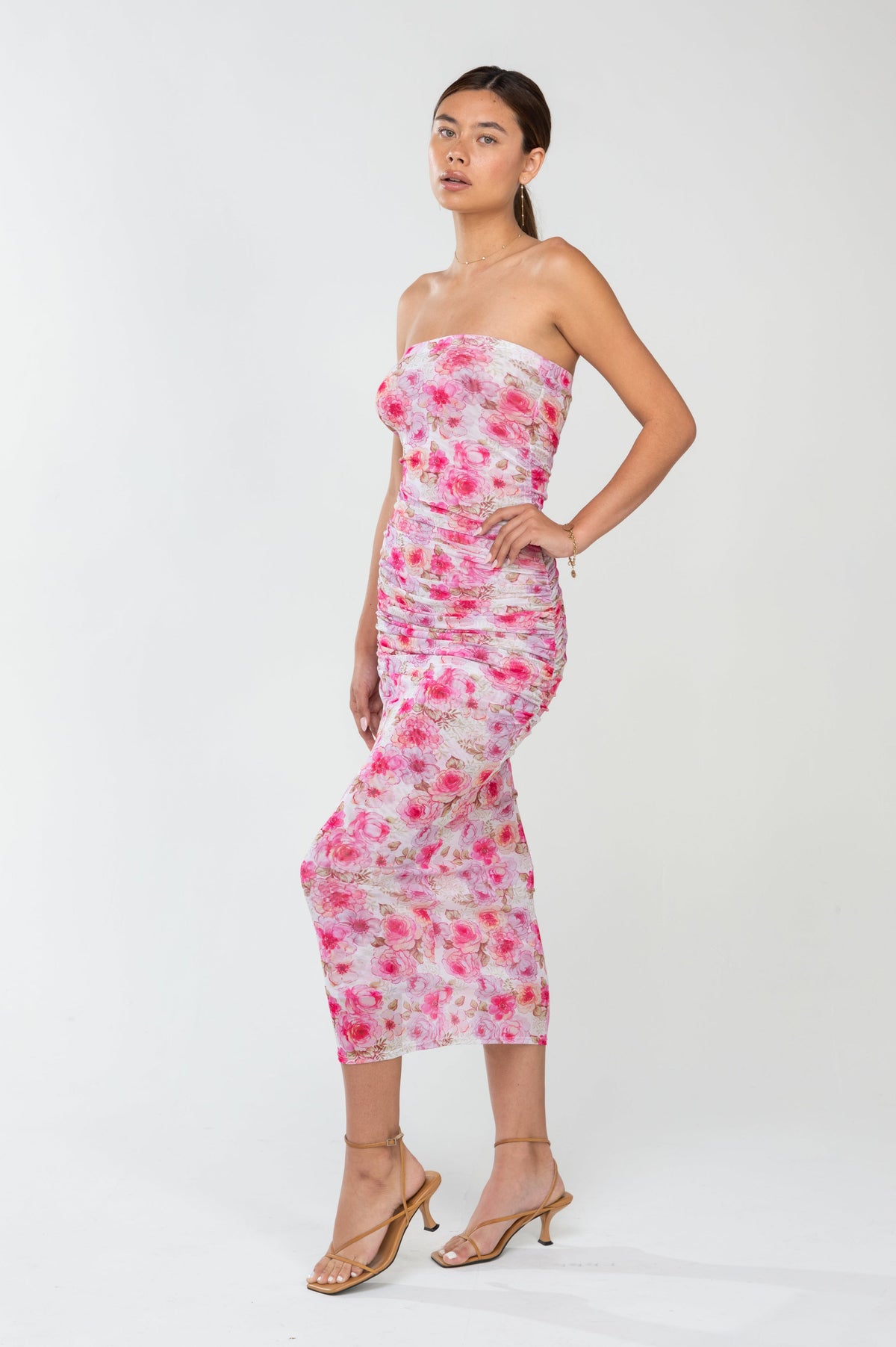 This is an image of Kristina Midi in Petal - RESA featuring a model wearing the dress
