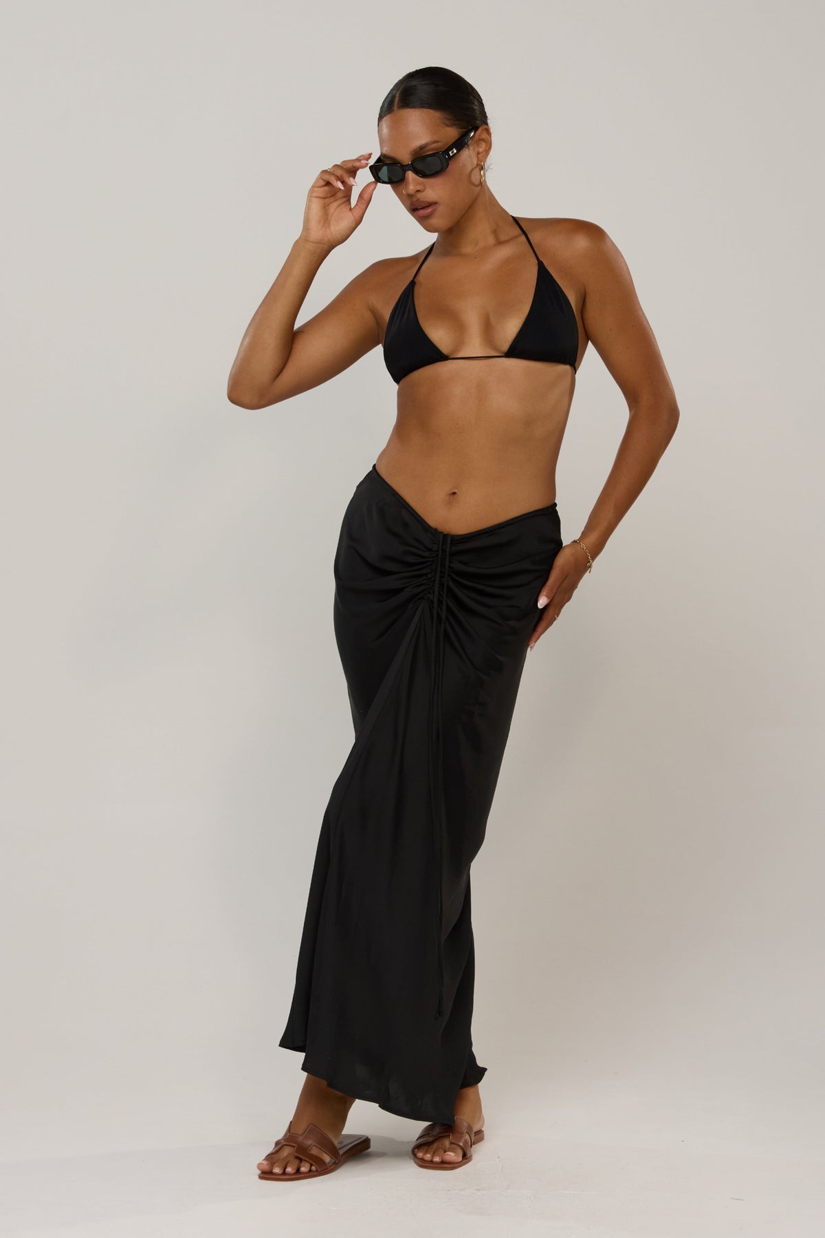 This is an image of Kyle in Black - RESA featuring a model wearing the dress